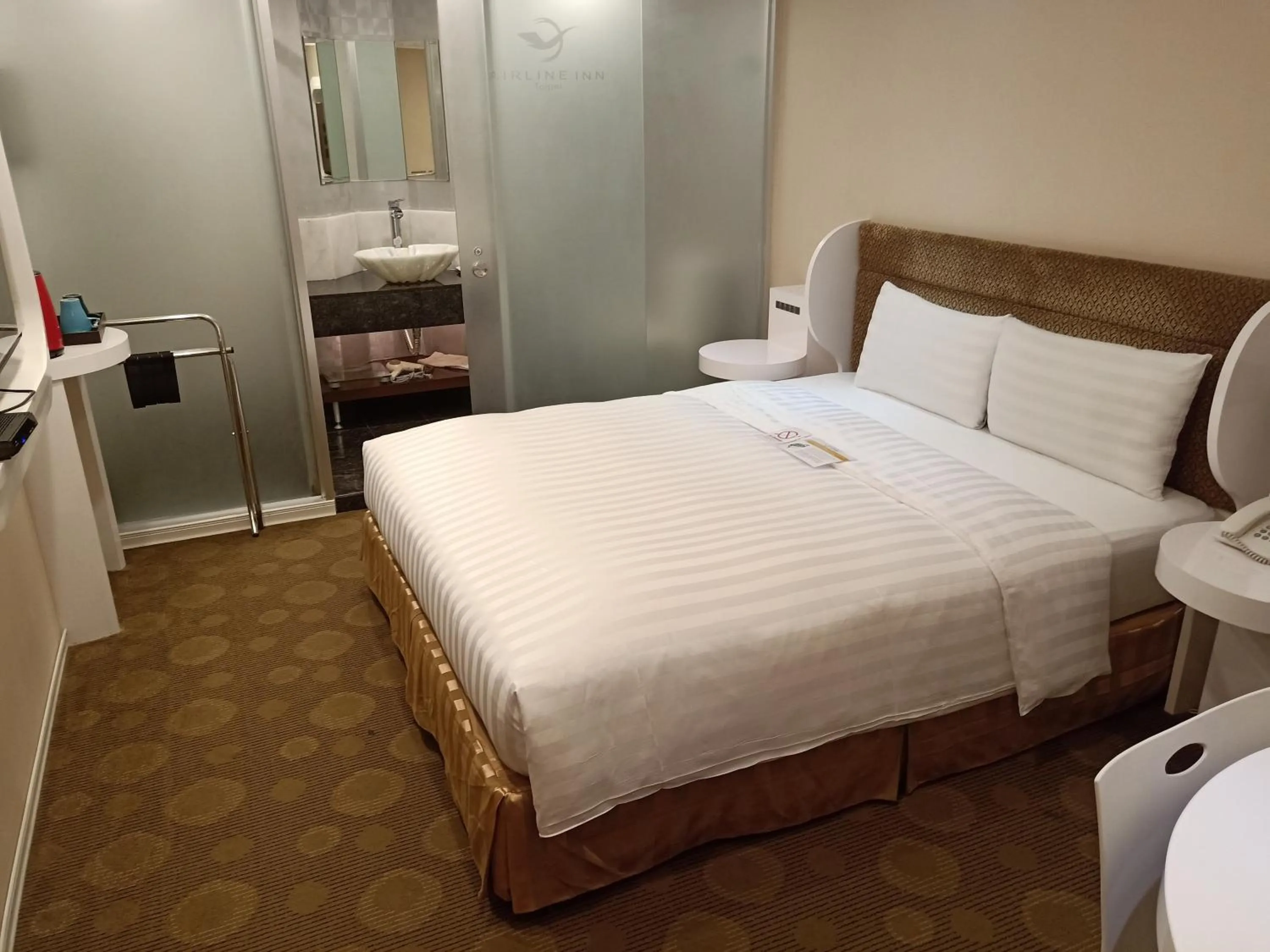 Bed in Ximen Airline Hotel