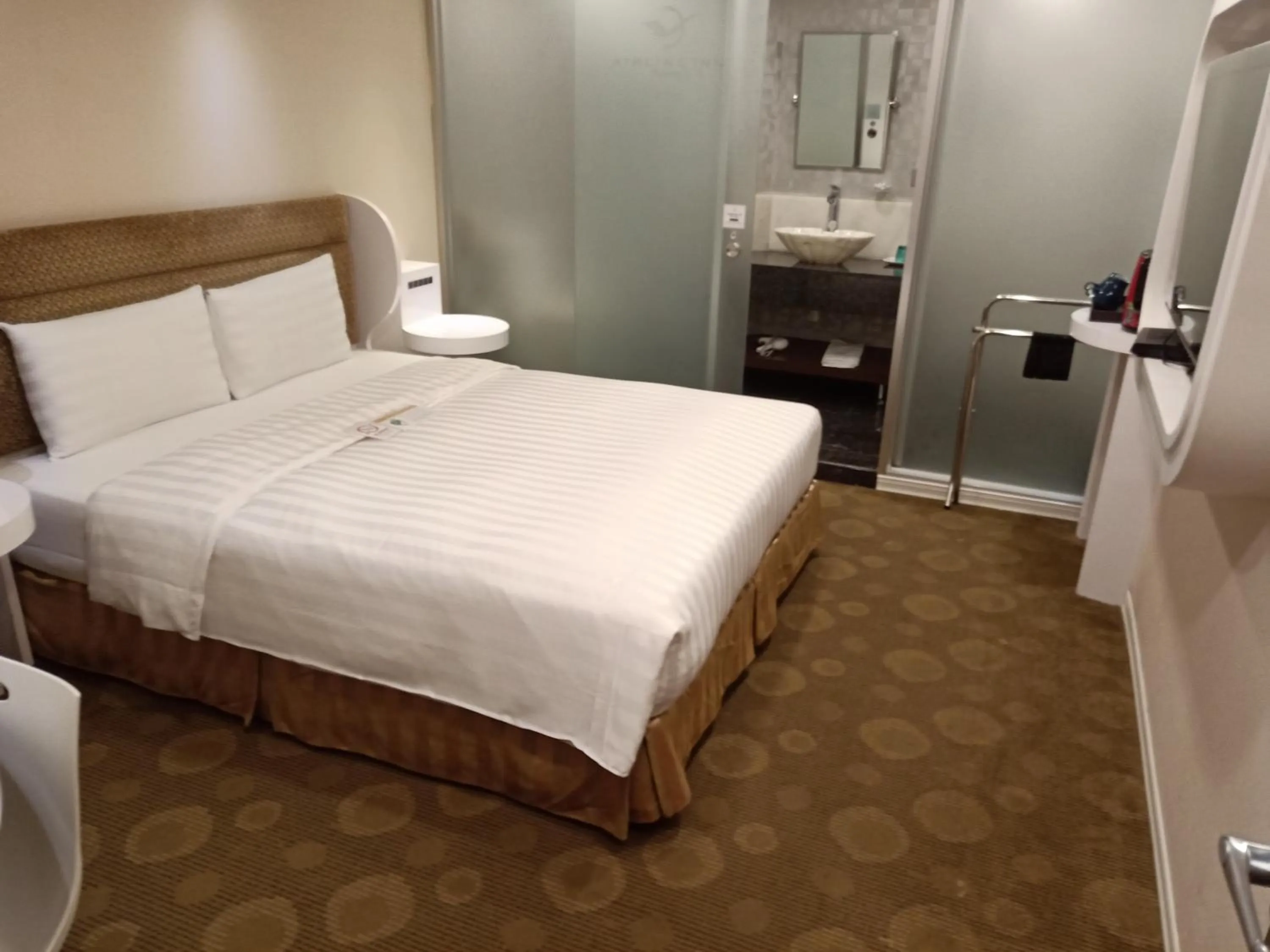 Bed in Ximen Airline Hotel