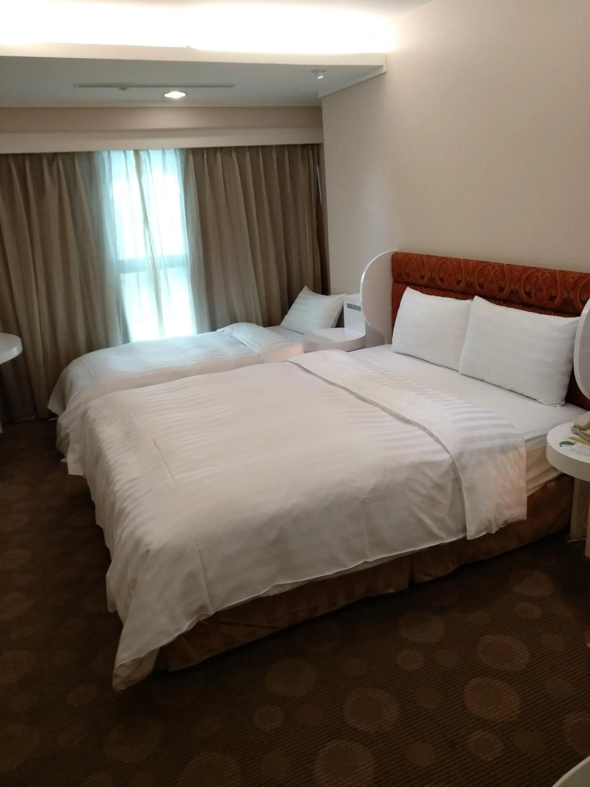 Bed in Ximen Airline Hotel