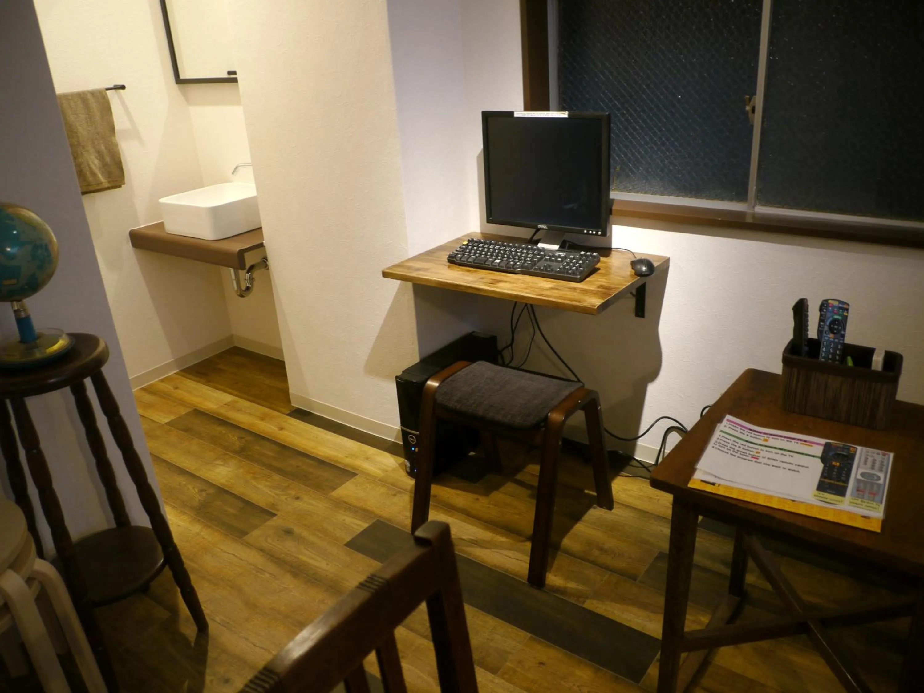 Communal lounge/ TV room in J-Hoppers Hiroshima Guesthouse