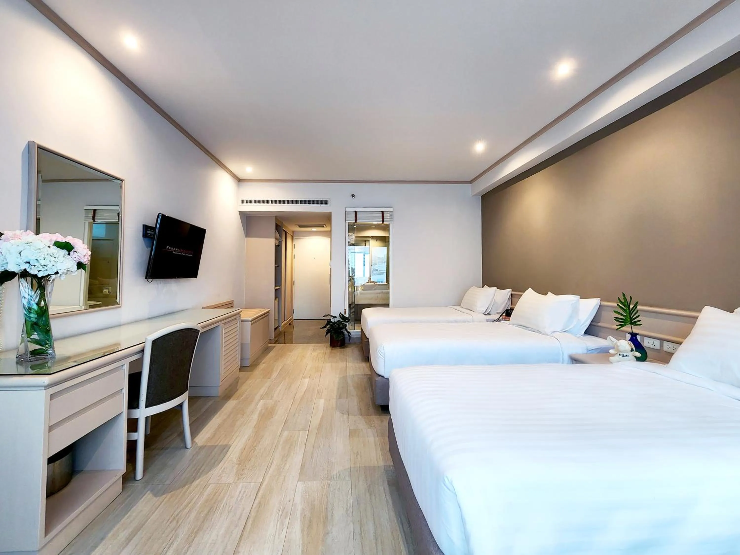 Bed in FuramaXclusive Pratunam Park Hotel