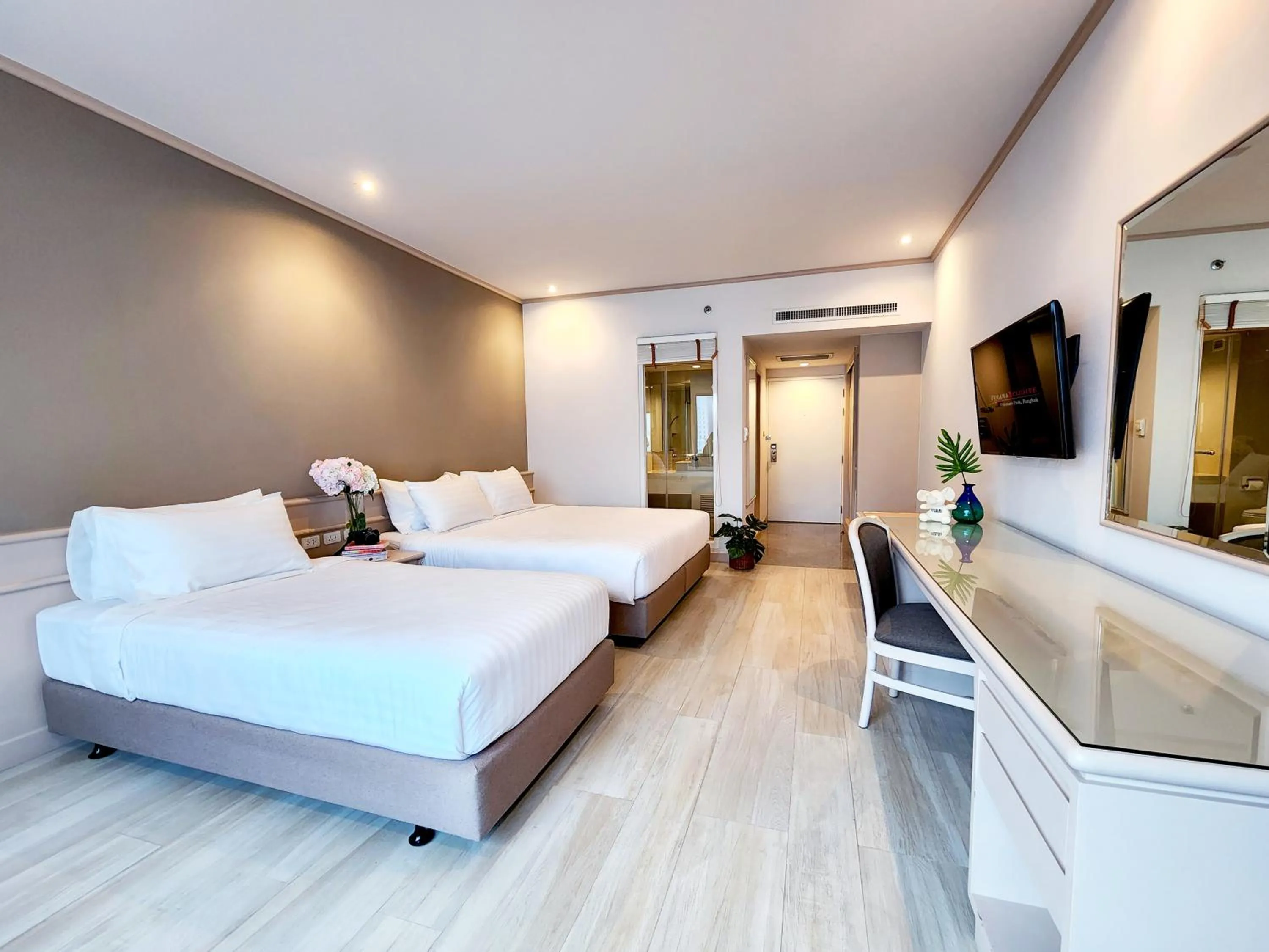 Bed in FuramaXclusive Pratunam Park Hotel