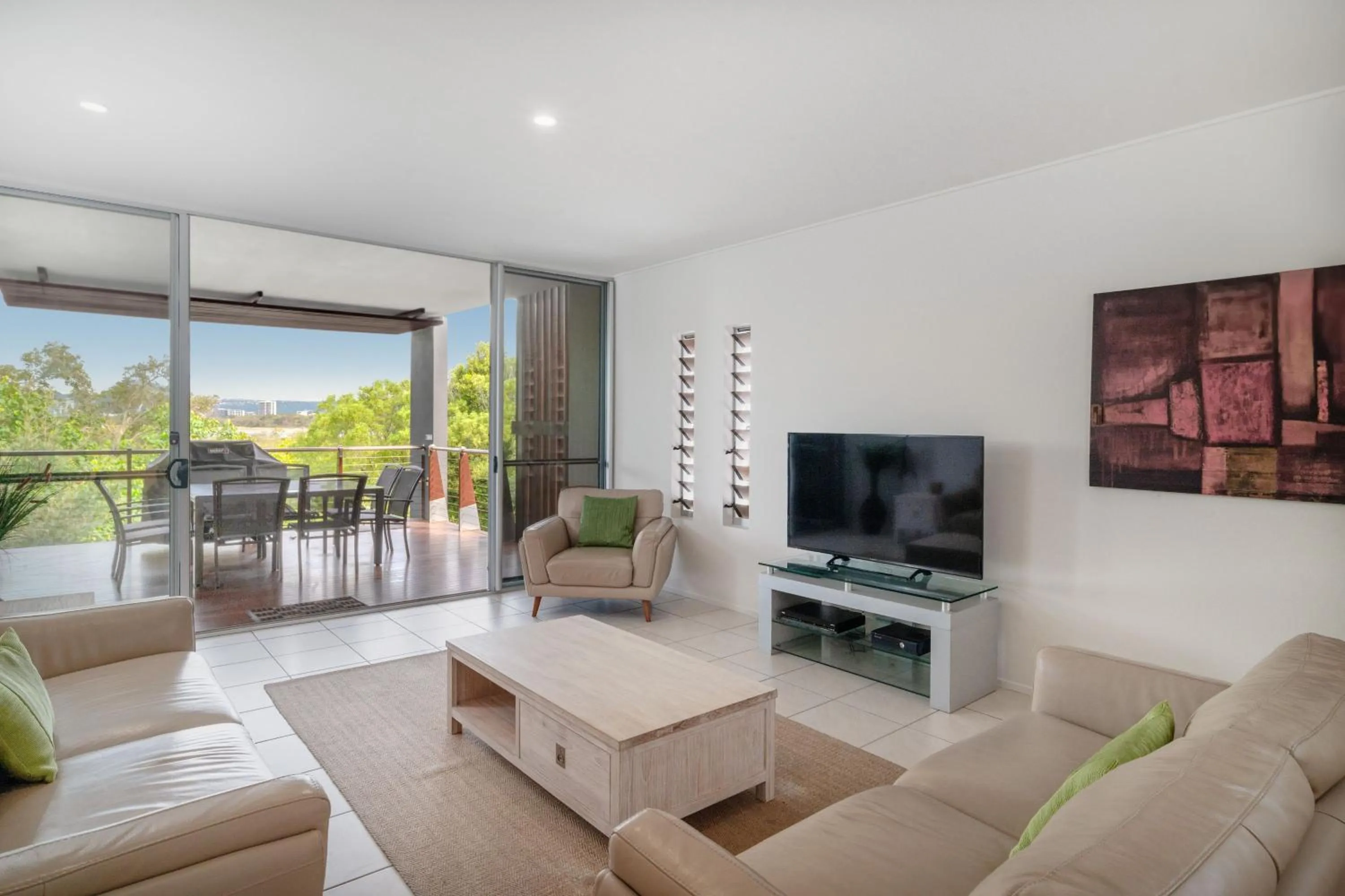 Living room in The Sebel Twin Waters