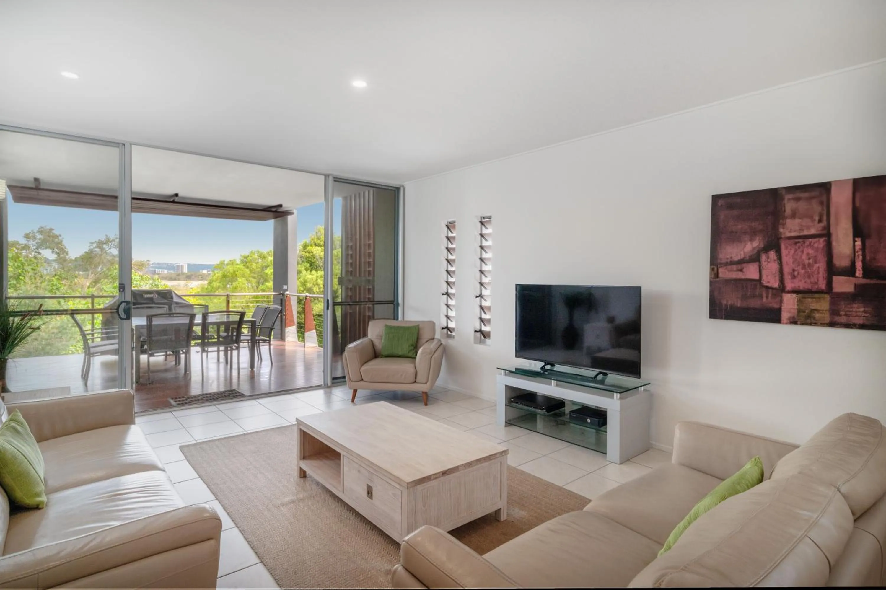 Communal lounge/ TV room in The Sebel Twin Waters