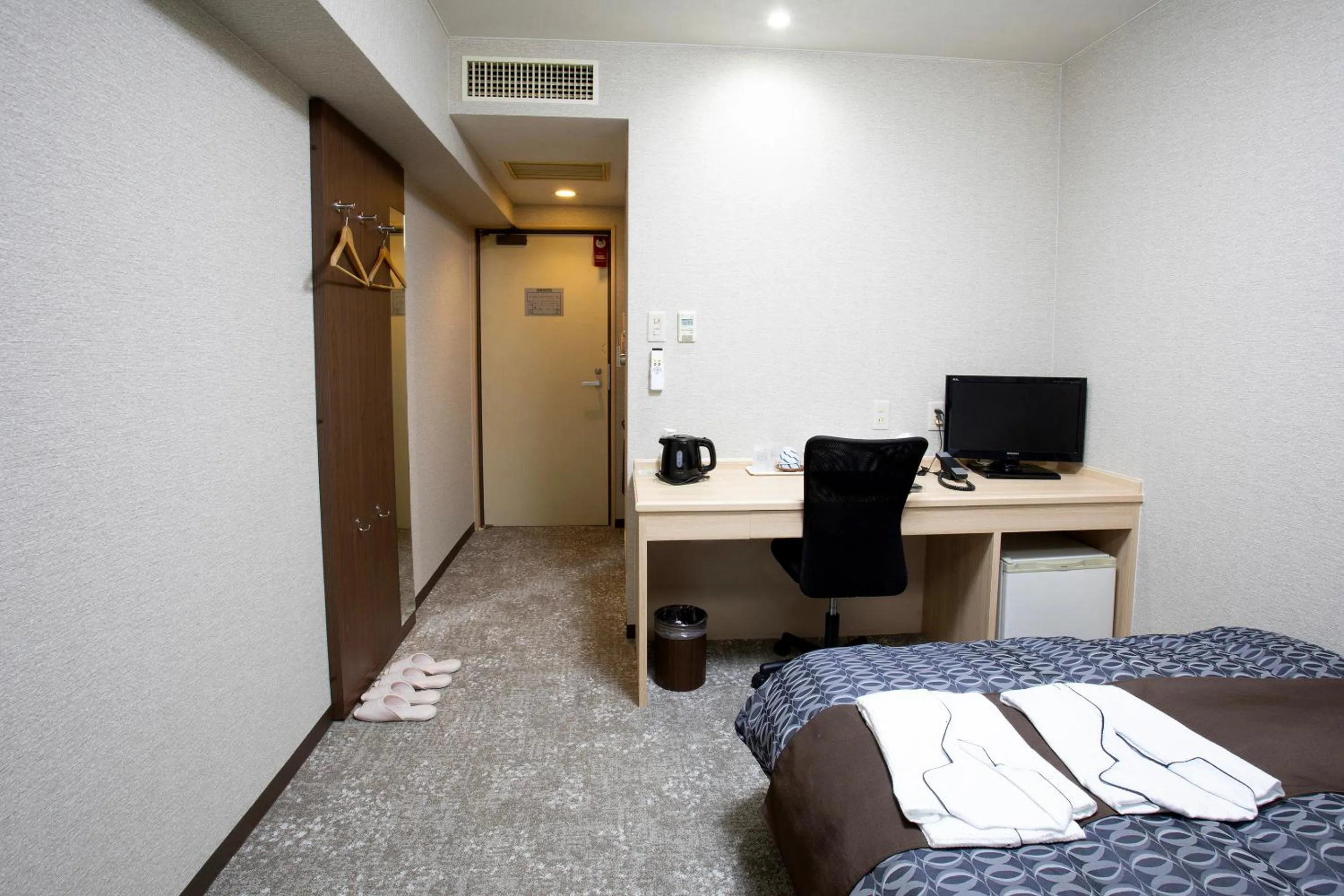 Bed in Nagasaki IK Hotel