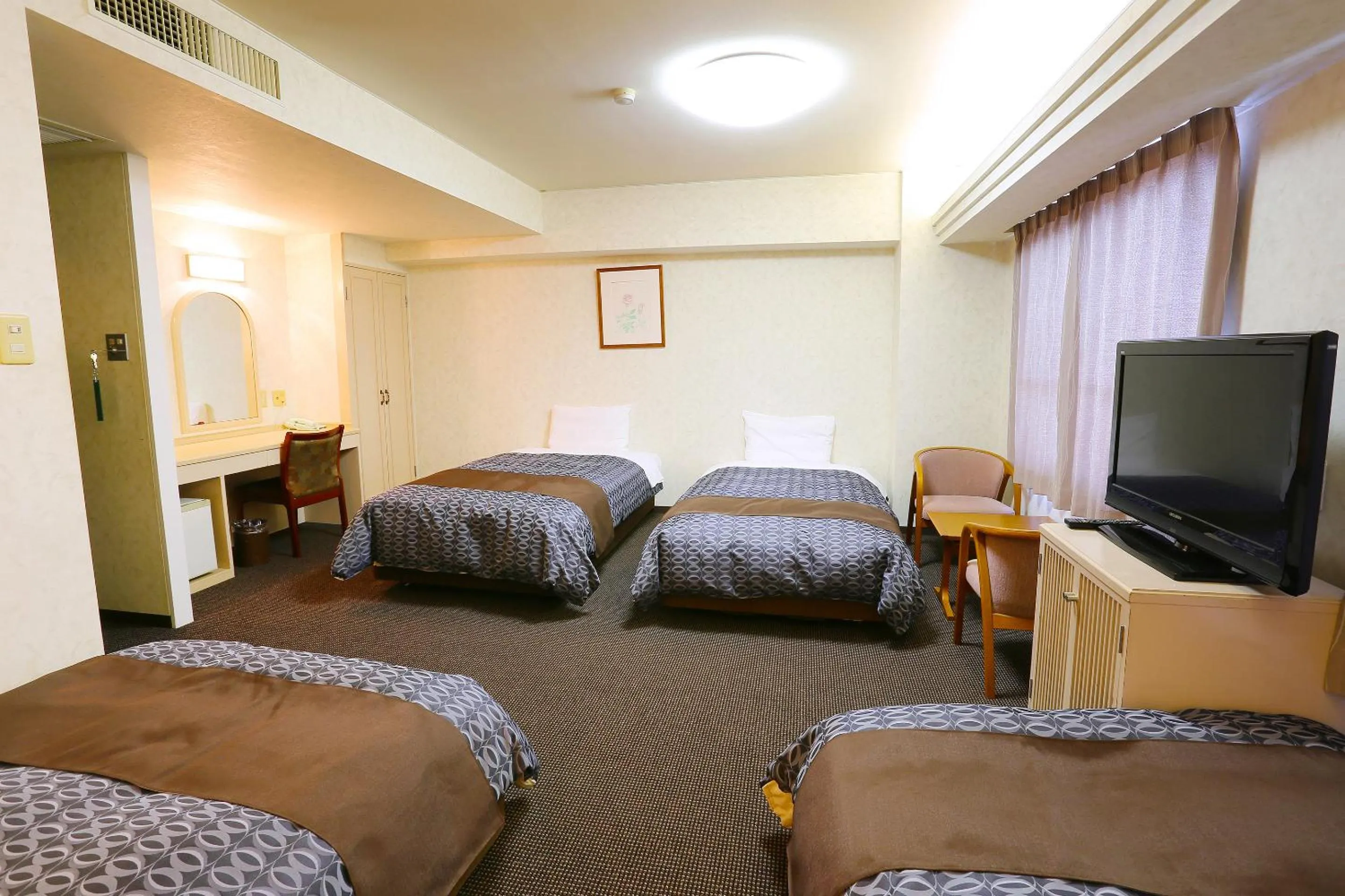 Bed in Nagasaki IK Hotel