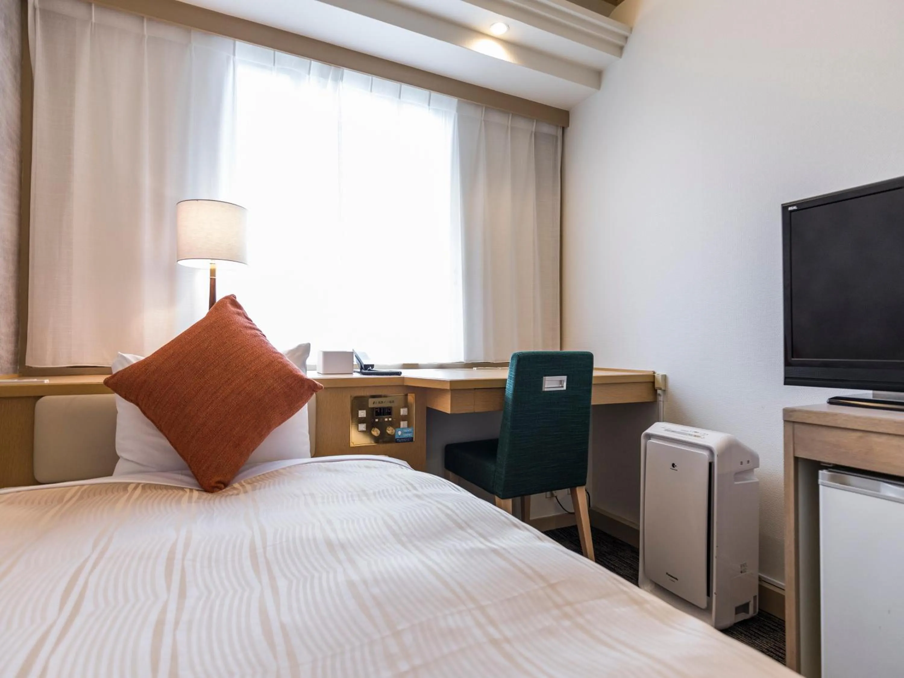 Photo of the whole room, Bed in Nishitetsu Inn Fukuoka