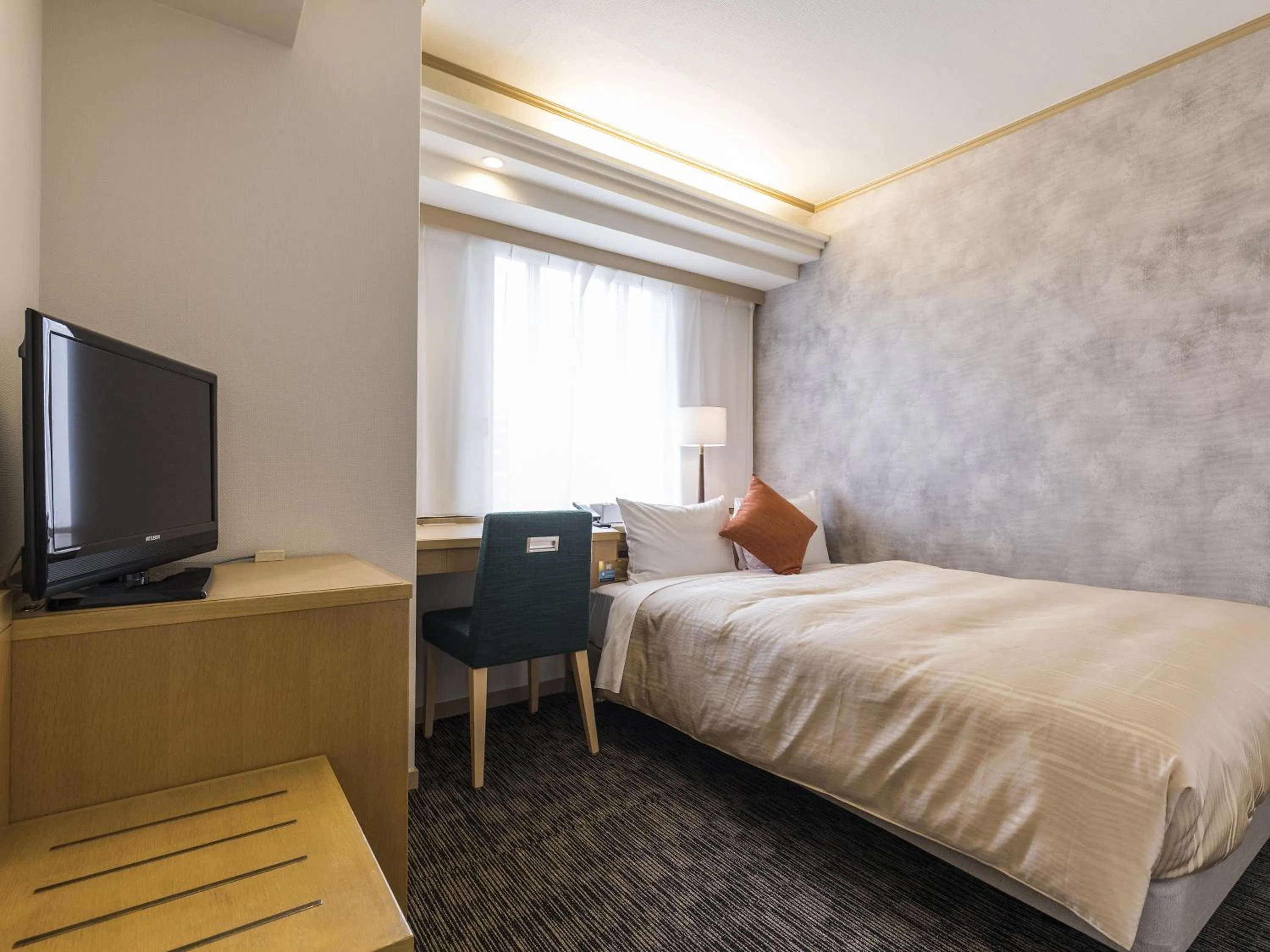 Photo of the whole room, Bed in Nishitetsu Inn Fukuoka