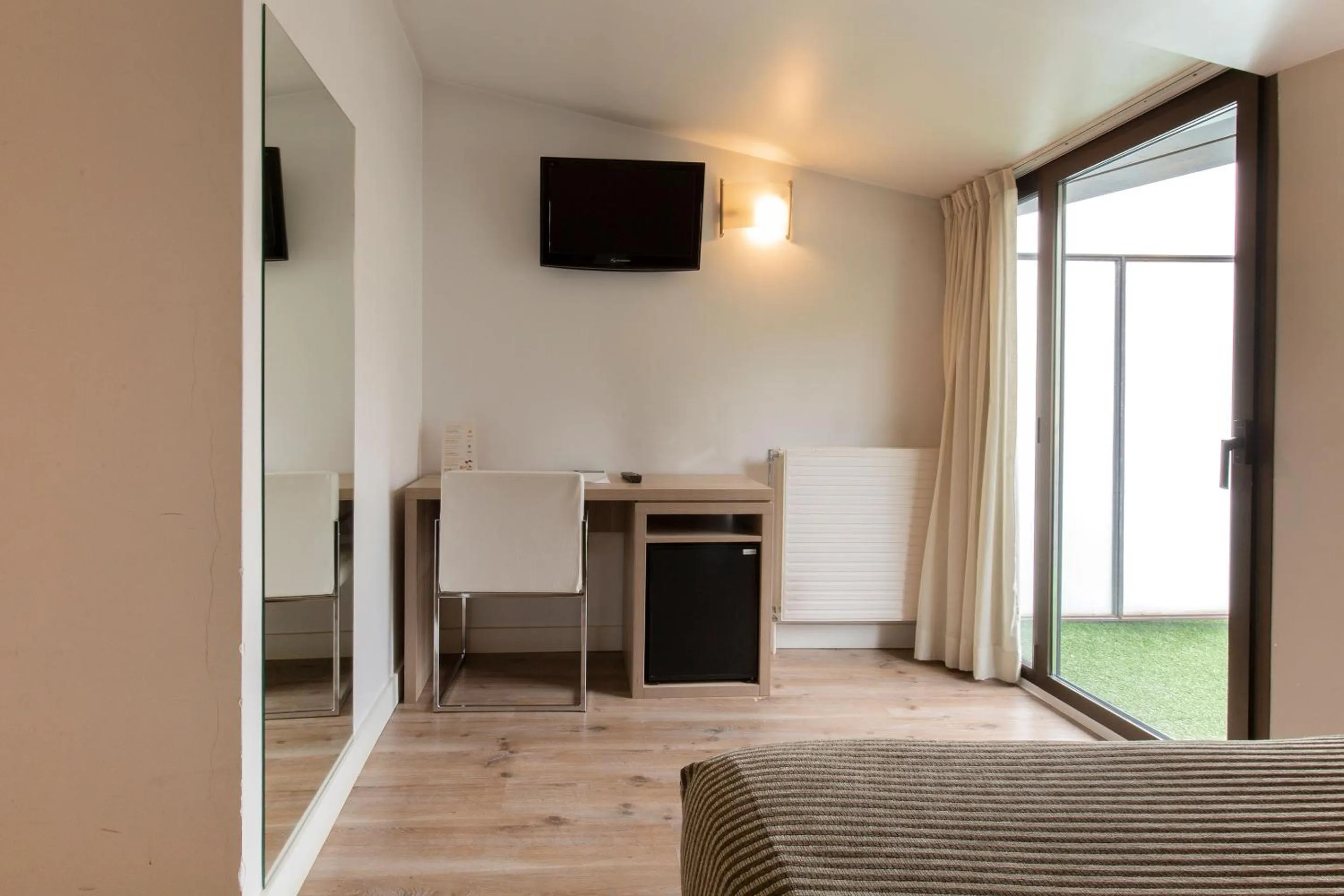 TV and multimedia in Hotel Del Pui by Nexta