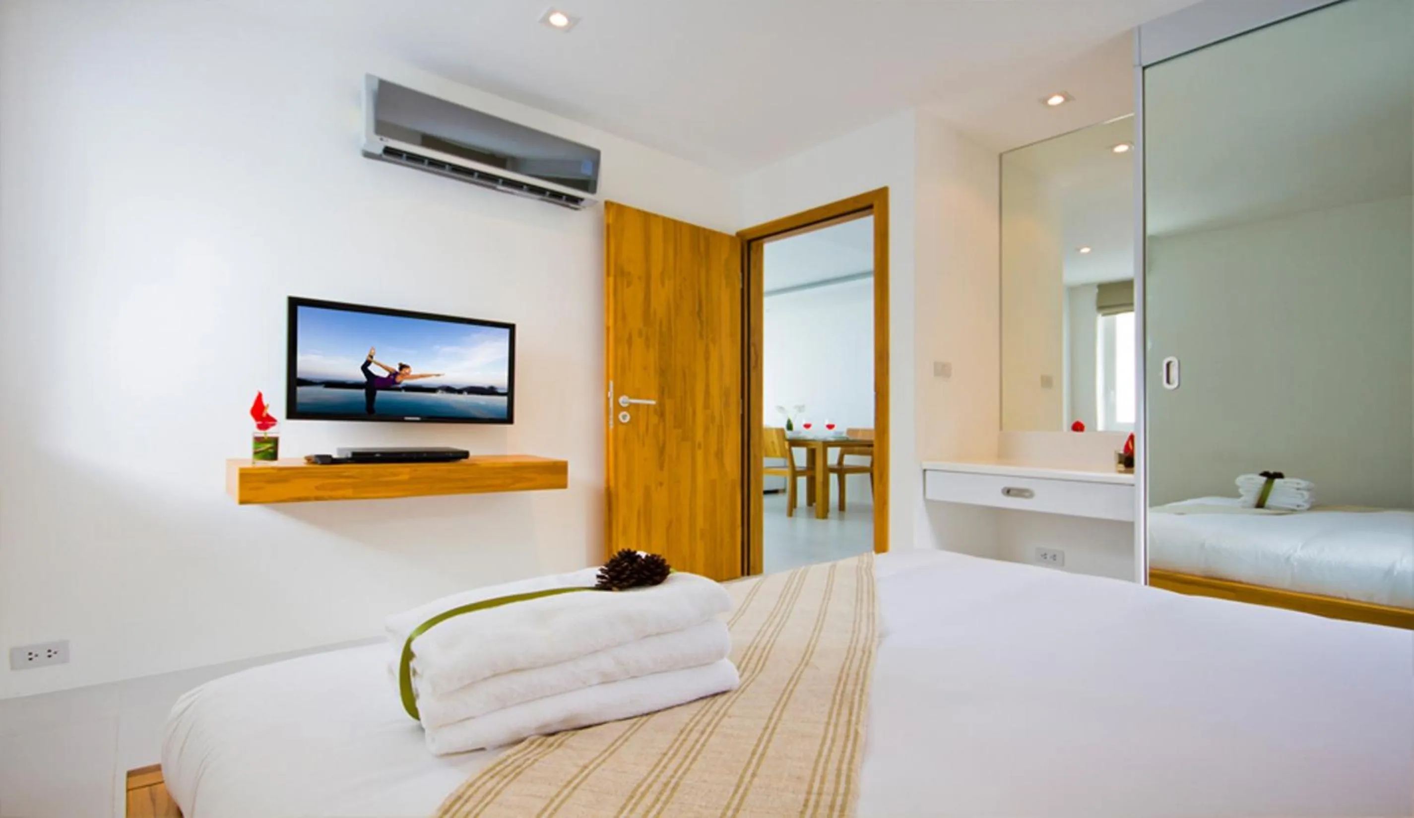 Bed in Code Samui Hotel