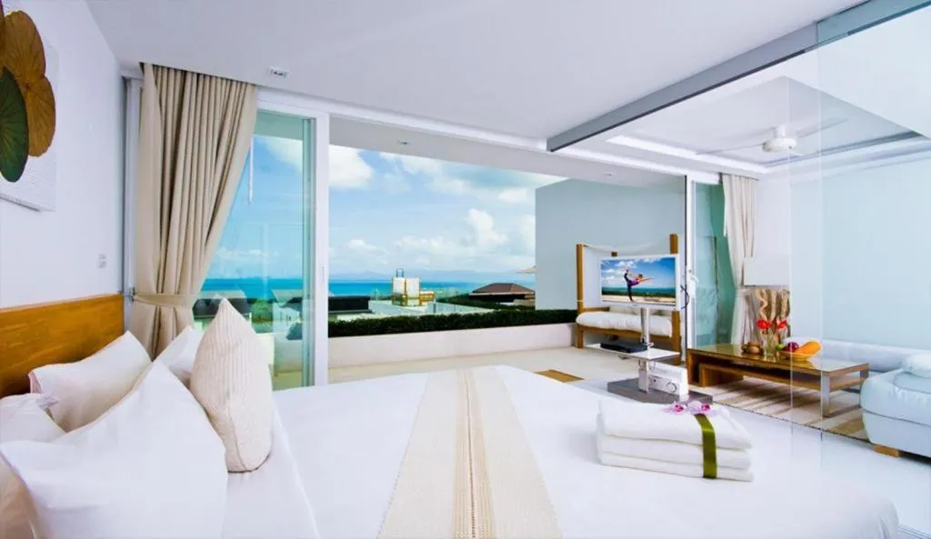 Living room, Bed in Code Samui Hotel