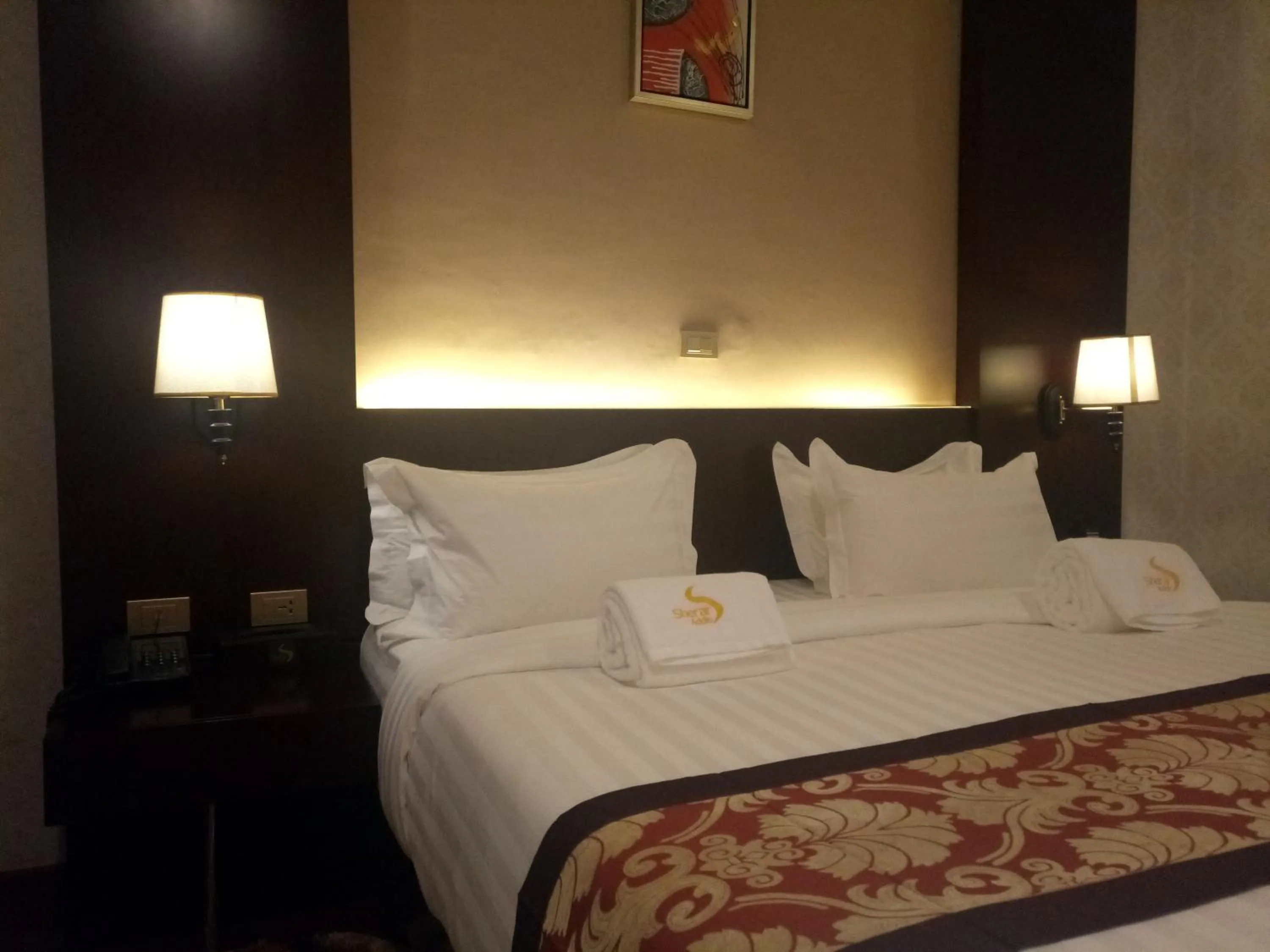 Bed in Sherar Addis Hotel