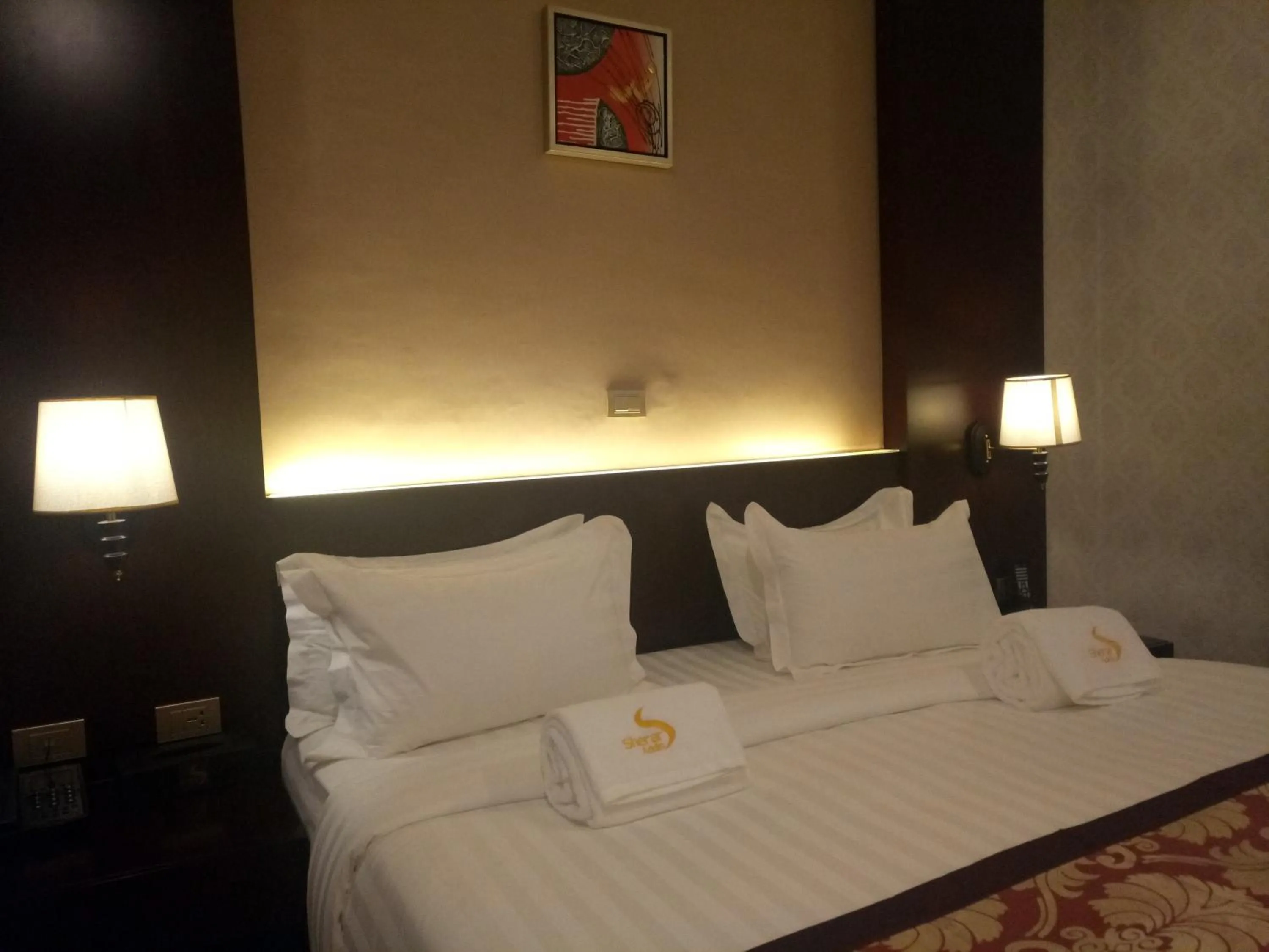 Bed in Sherar Addis Hotel