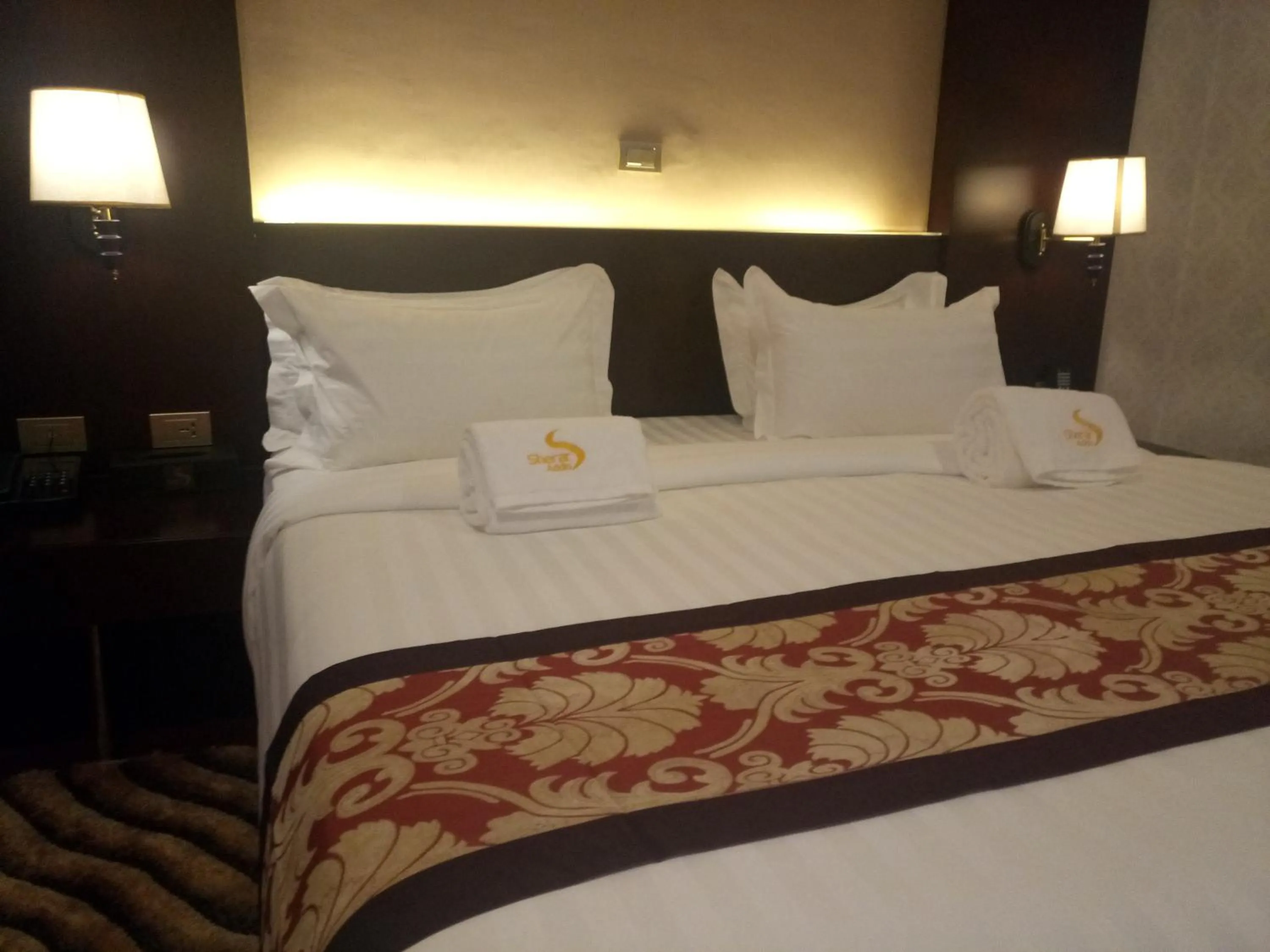 Bed in Sherar Addis Hotel