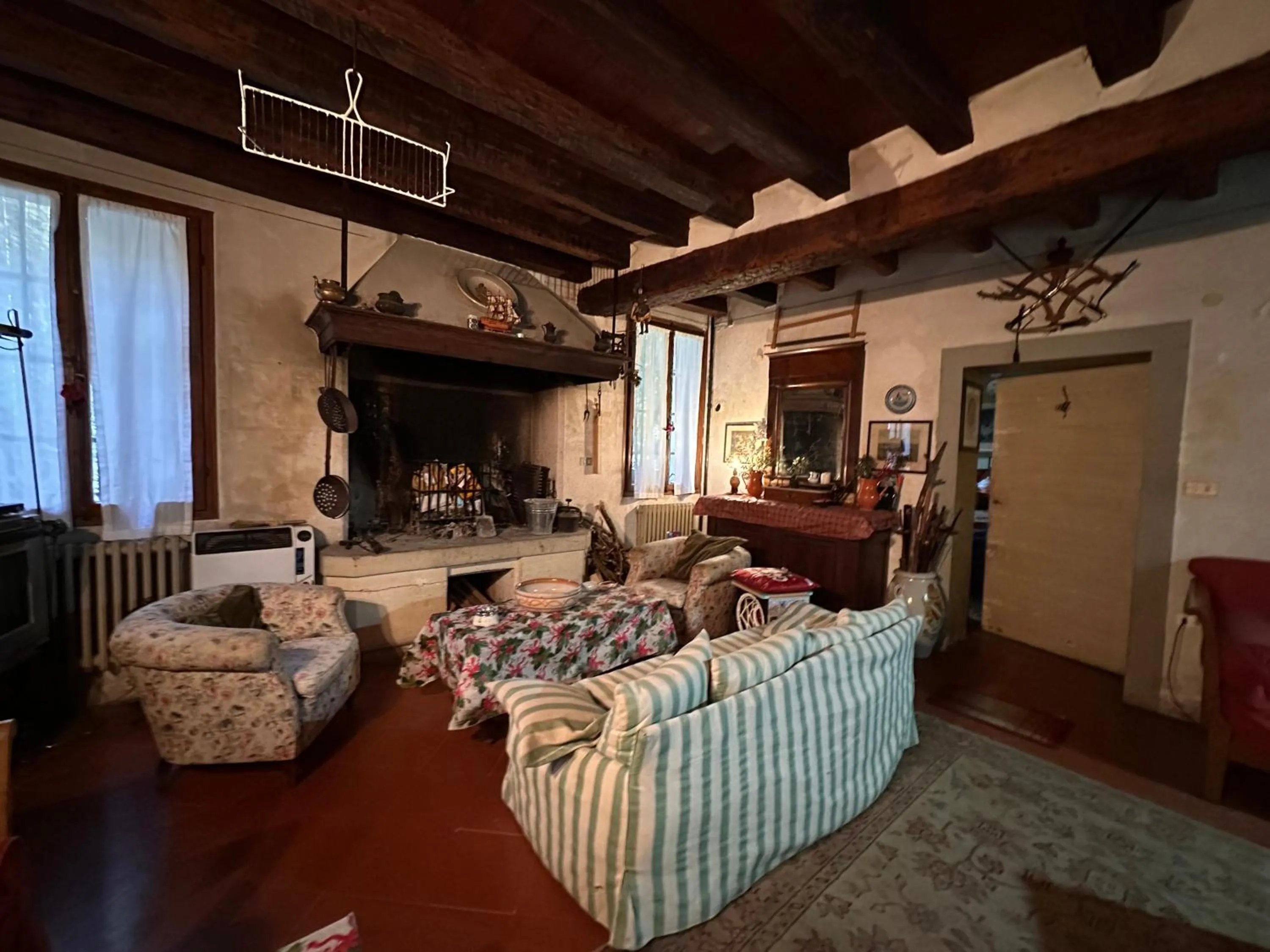 Communal lounge/ TV room in B&B Villa Gradenigo