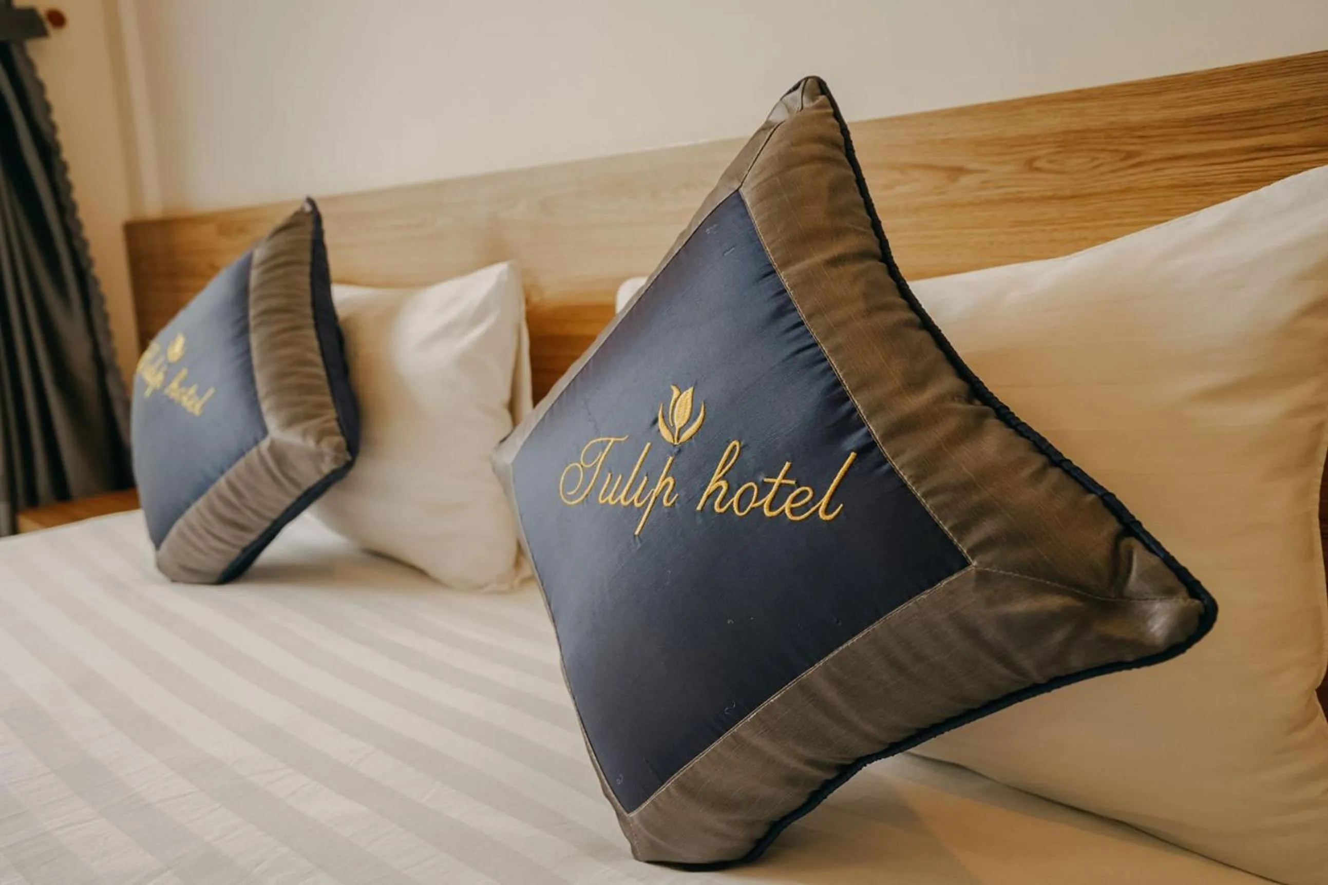 Property logo or sign, Bed in Tulip Hotel