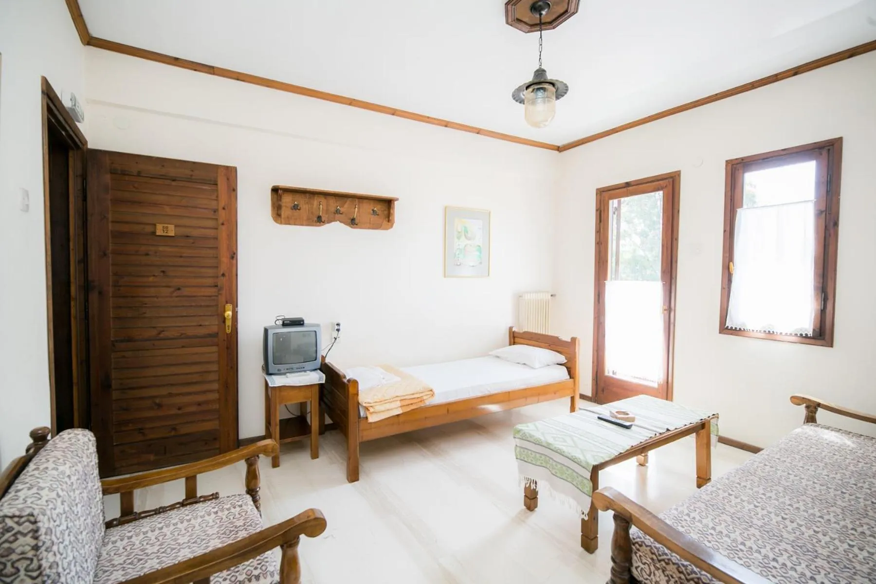 Living room, Bed in Apartments Hotel Magani