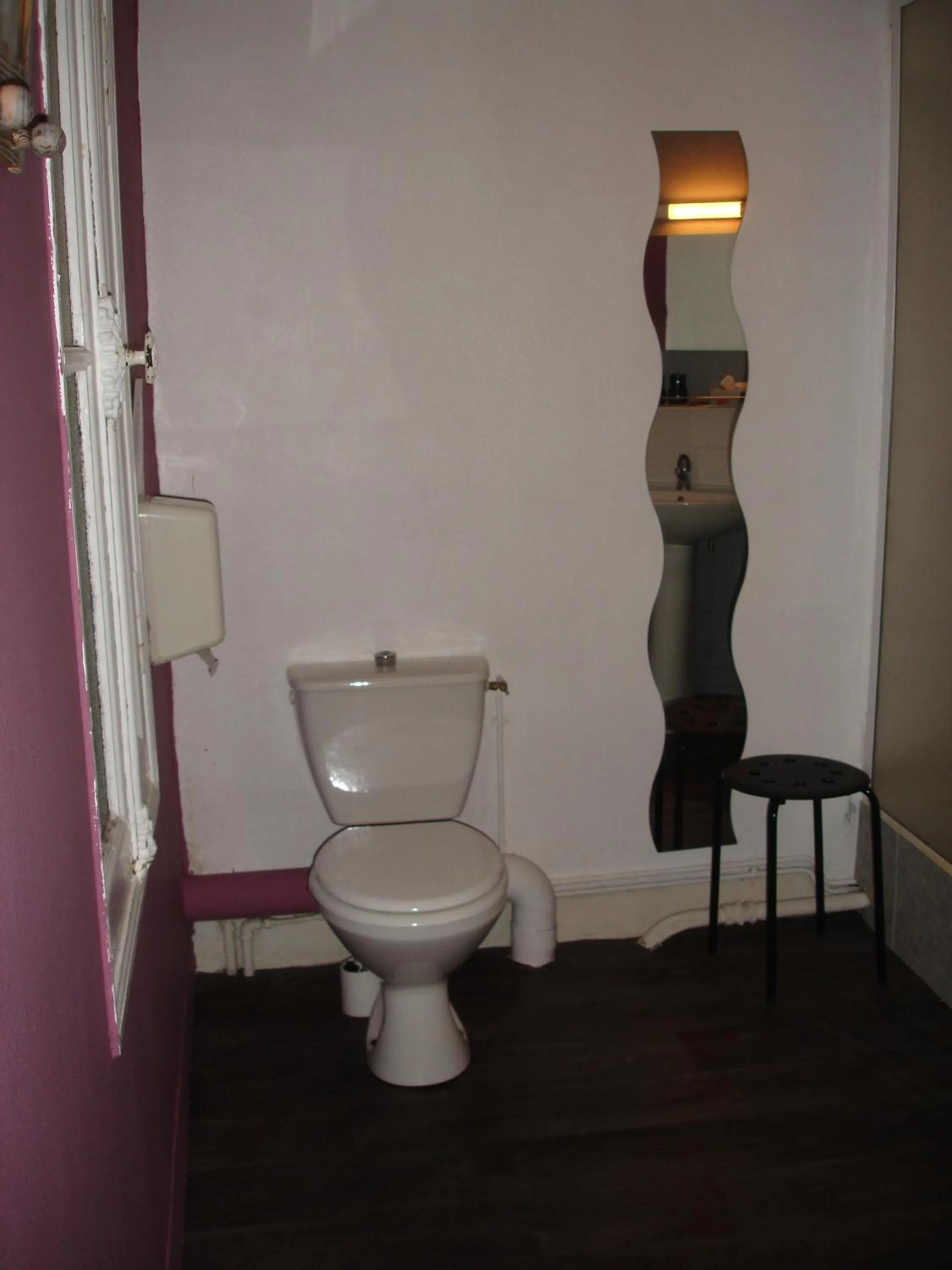 Bedroom in Hôtel de La Marmotte