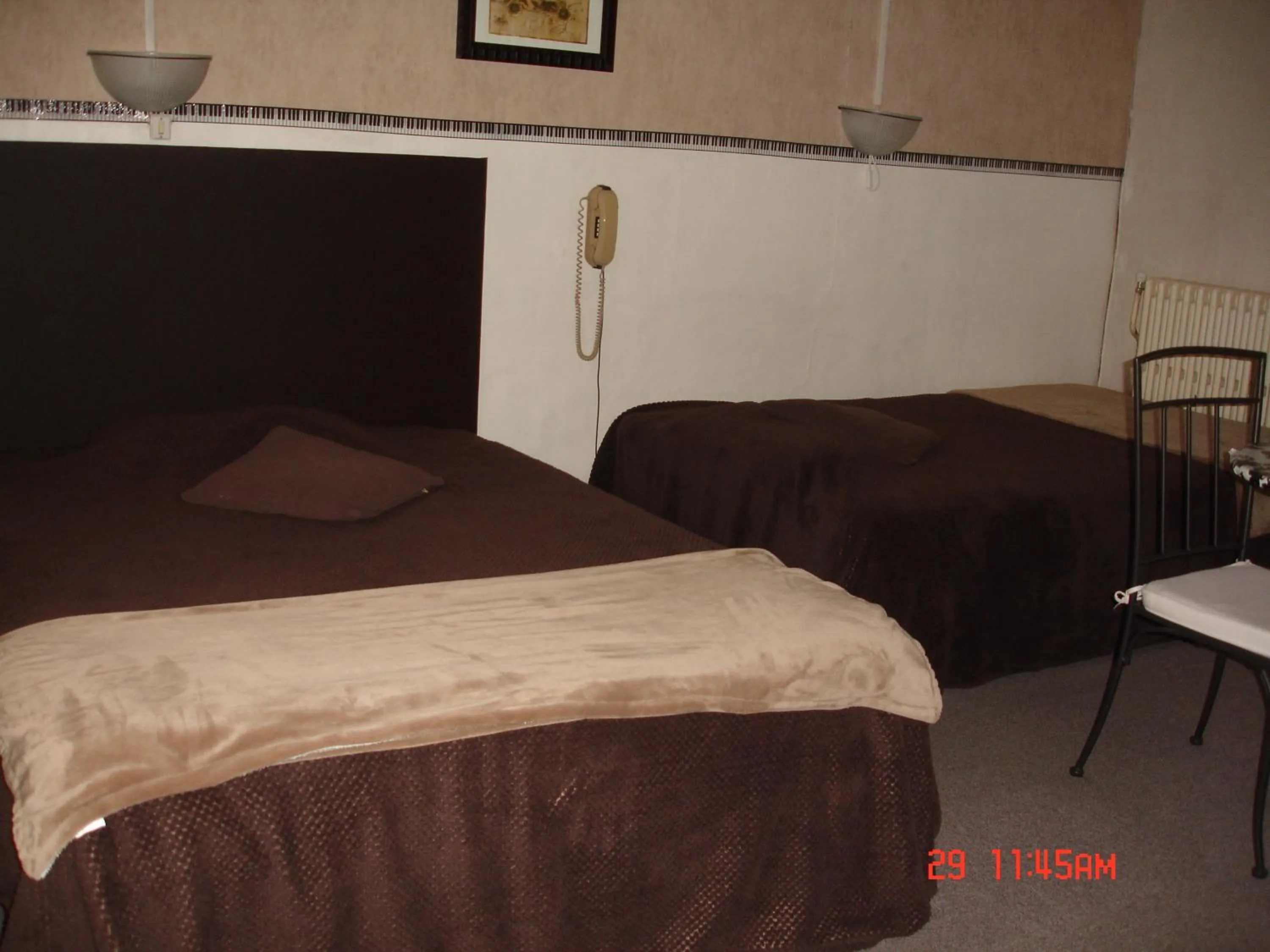 Bedroom, Bed in Hôtel de La Marmotte