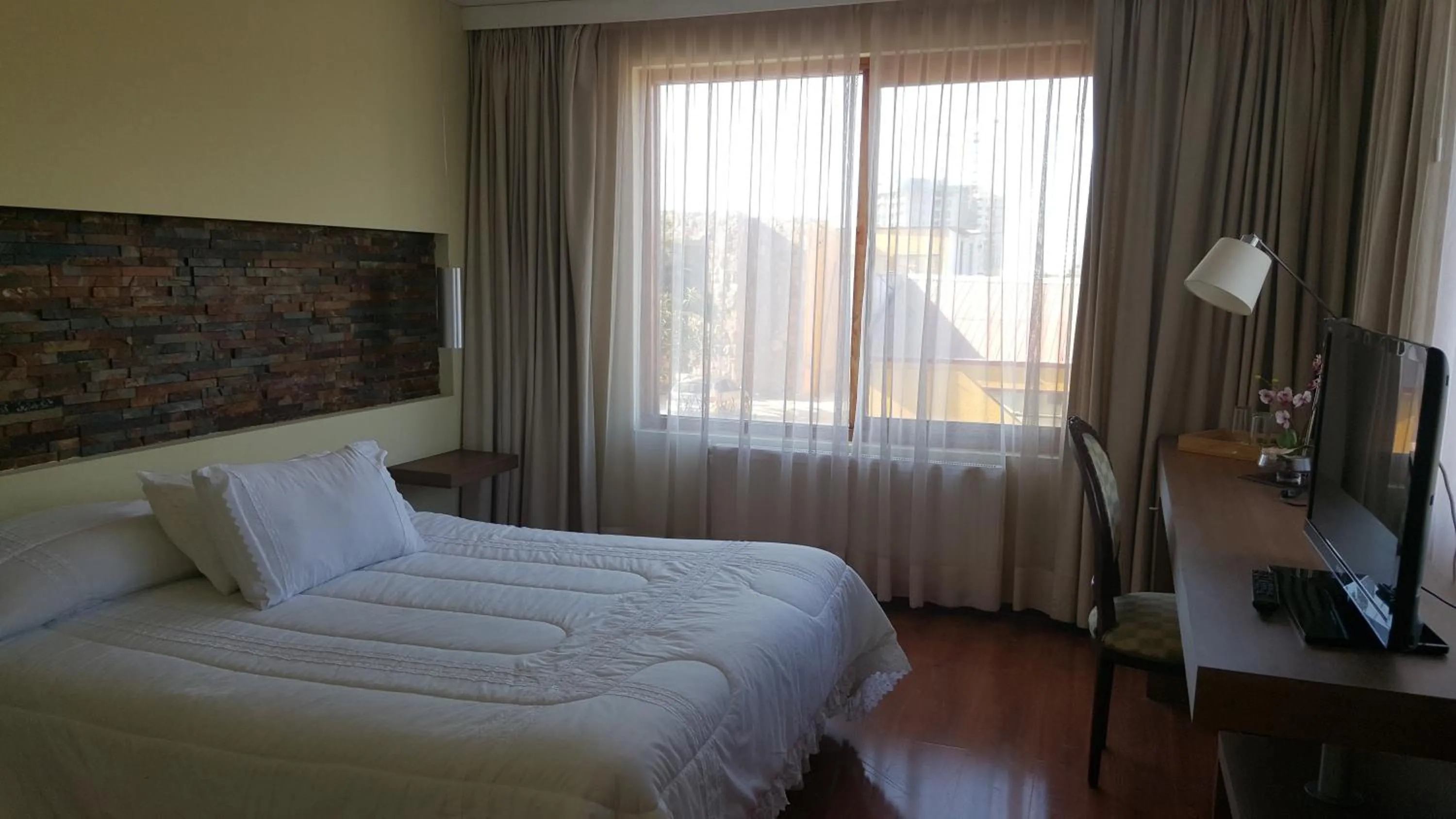 Photo of the whole room, Bed in Hotel La Serena Plaza