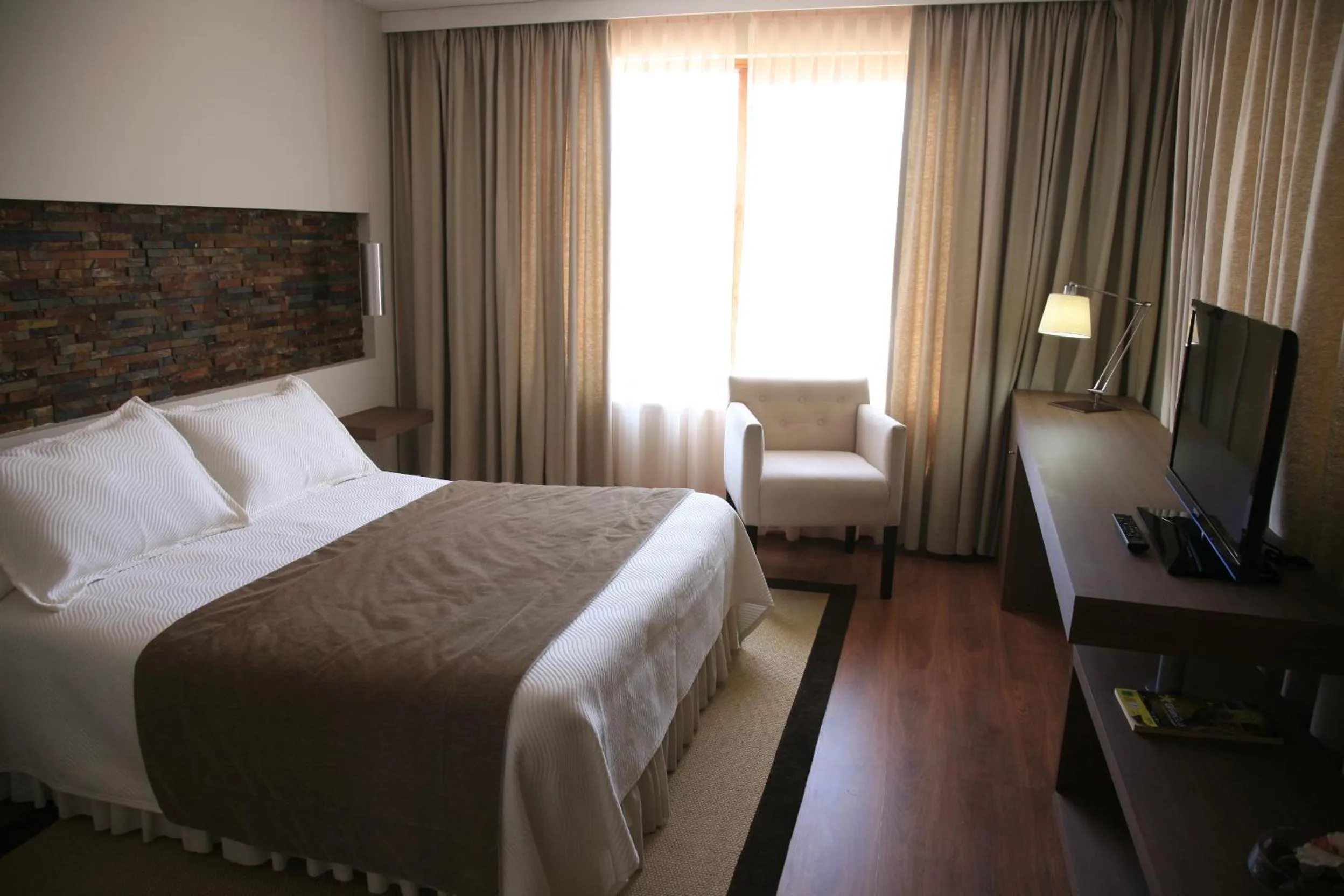 Photo of the whole room, Bed in Hotel La Serena Plaza