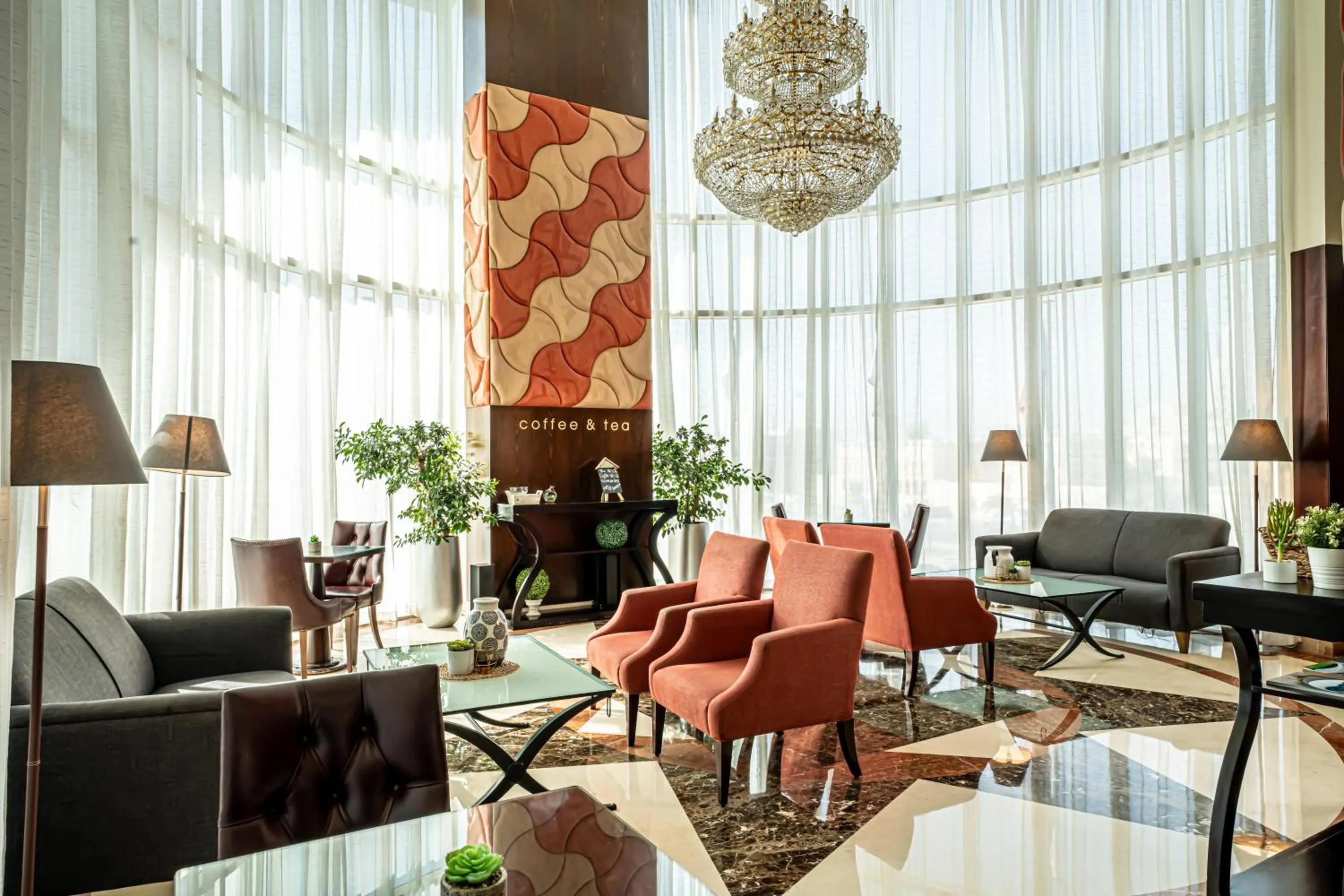 Living room in Kingsgate Hotel Doha by Millennium Hotels