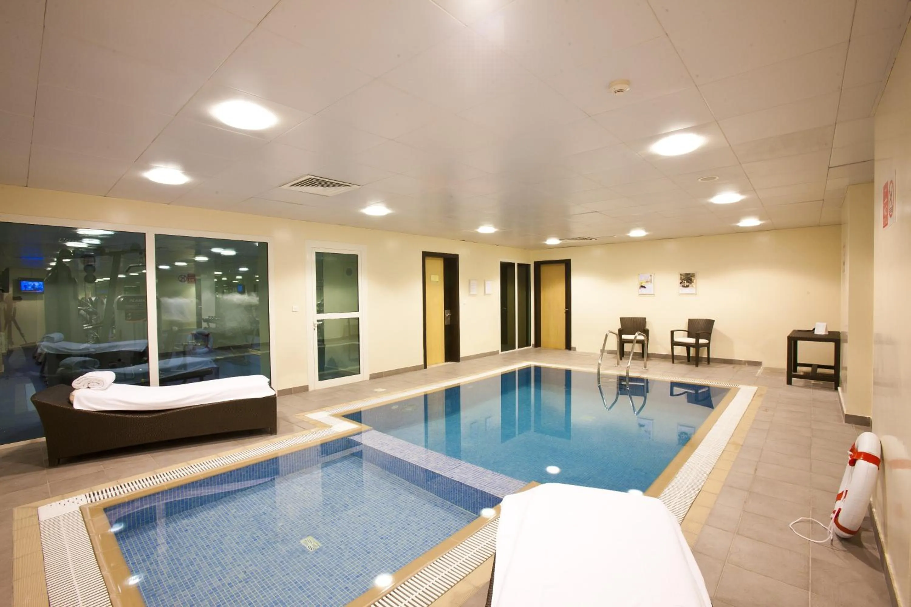 Swimming pool in Kingsgate Hotel Doha by Millennium Hotels