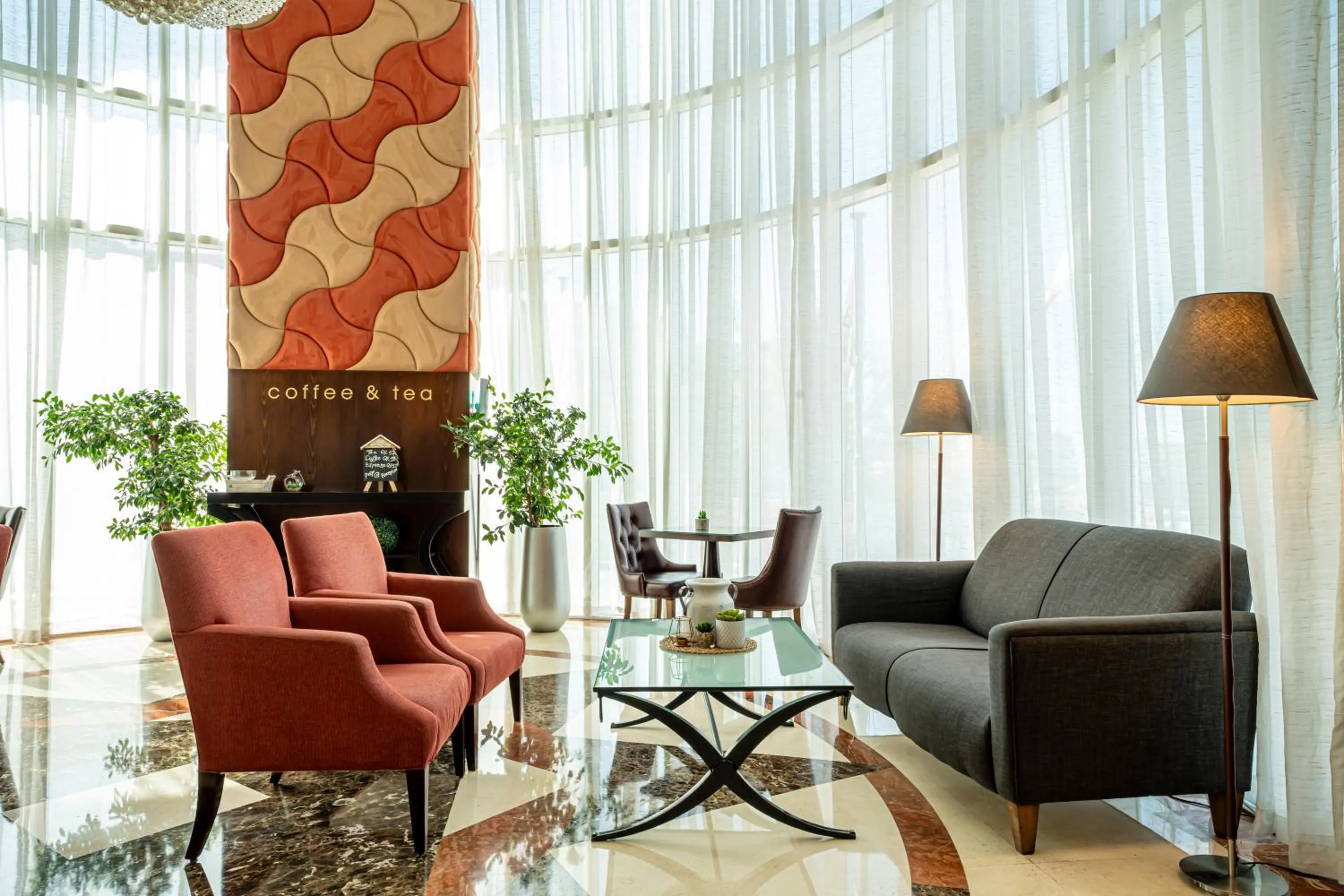 Seating area in Kingsgate Hotel Doha by Millennium Hotels