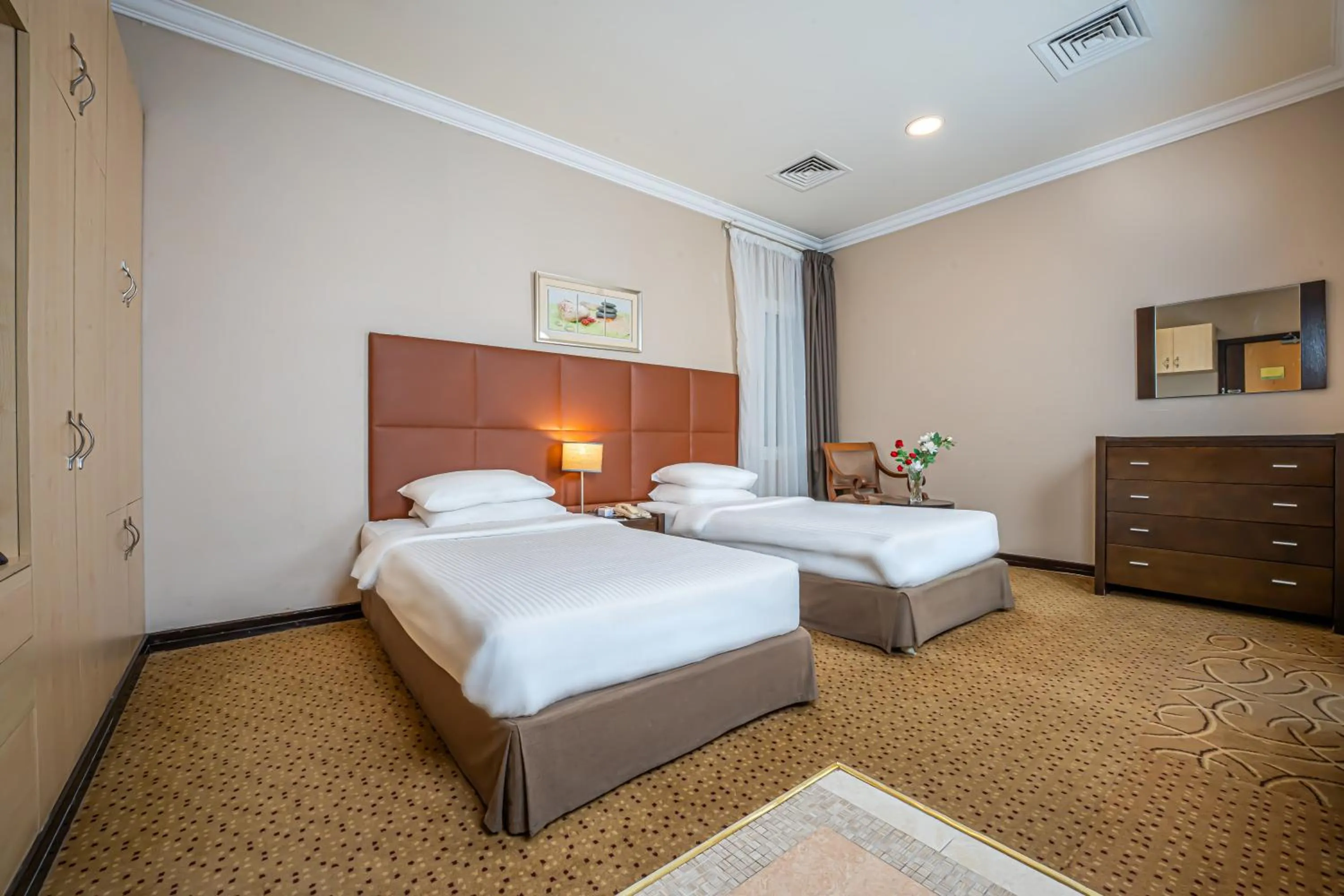 Bedroom, Bed in Kingsgate Hotel Doha by Millennium Hotels