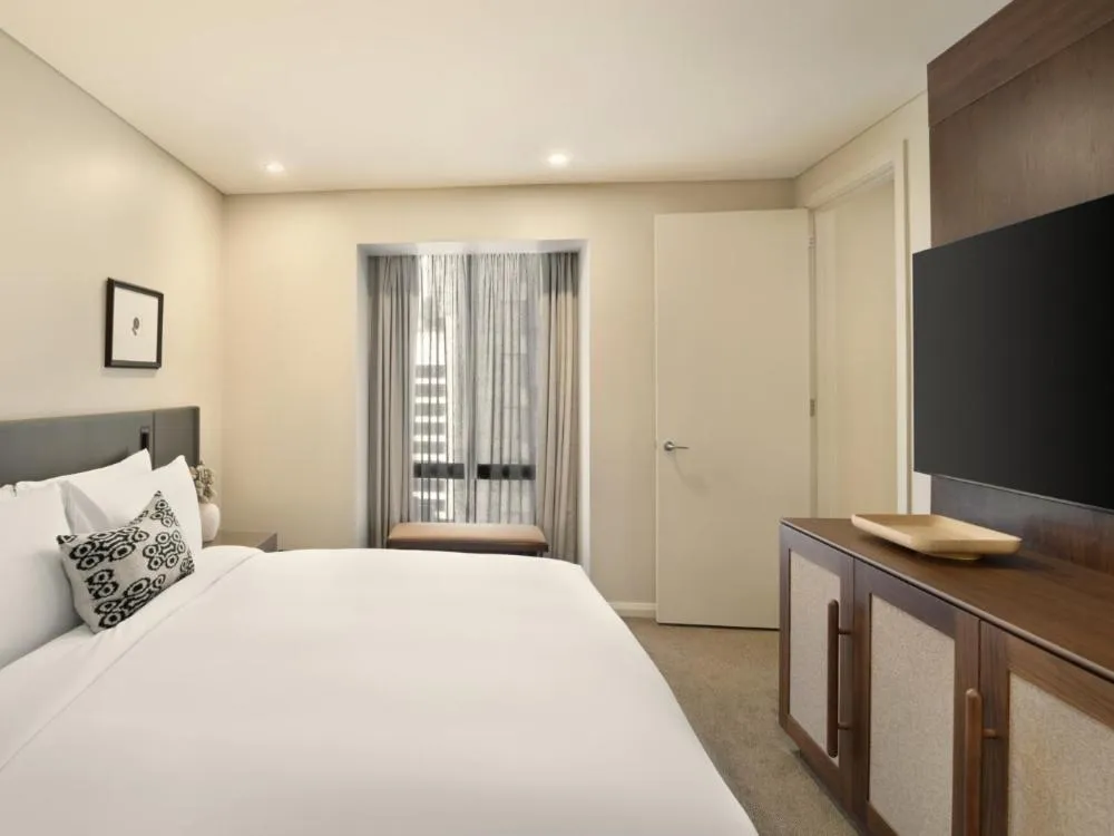 Bed in Sofitel Sydney Wentworth