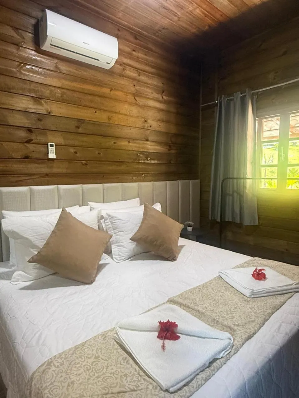 Bed in Pousada Dona Carmita