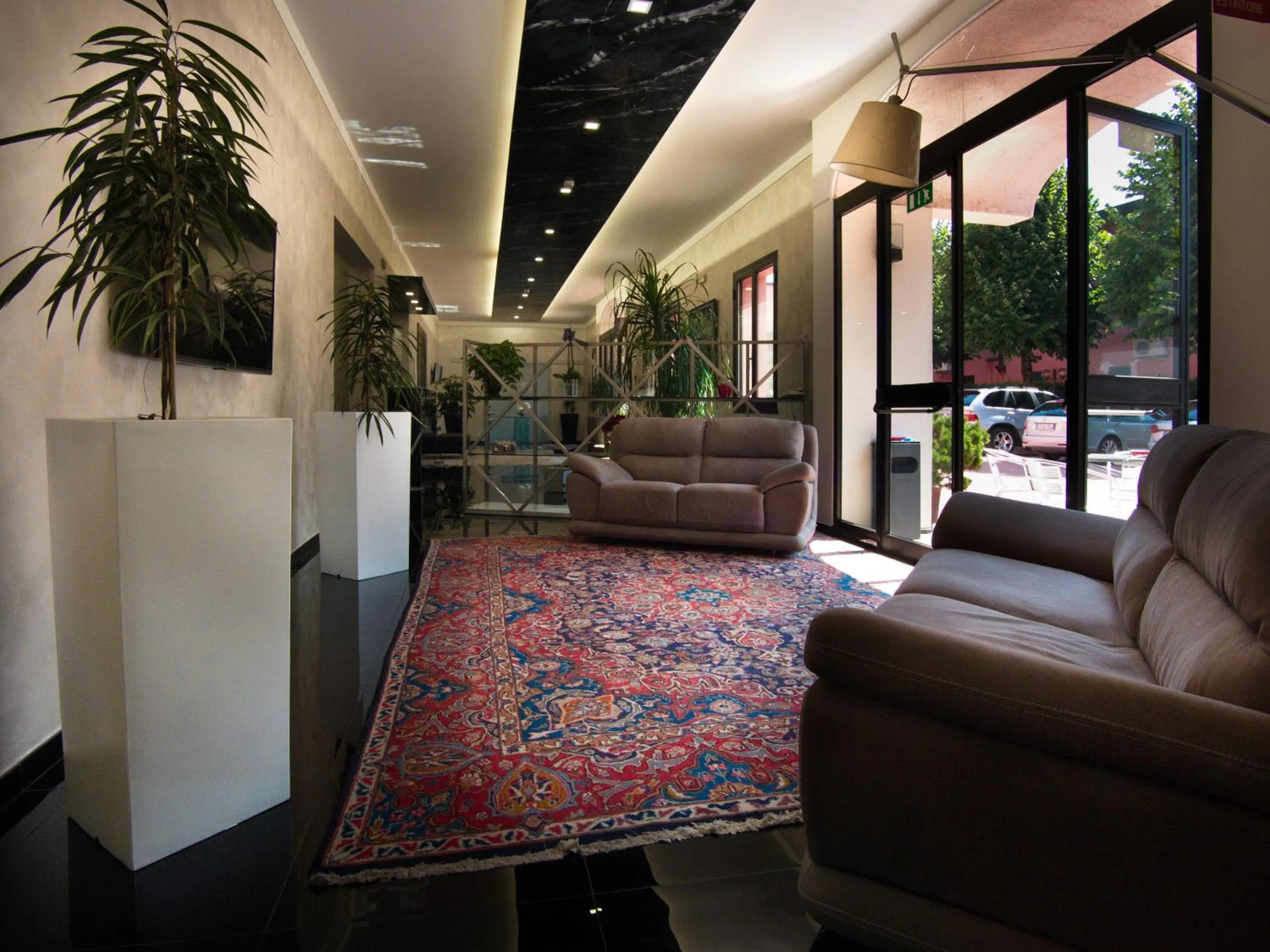 Lobby or reception in Hotel Versailles