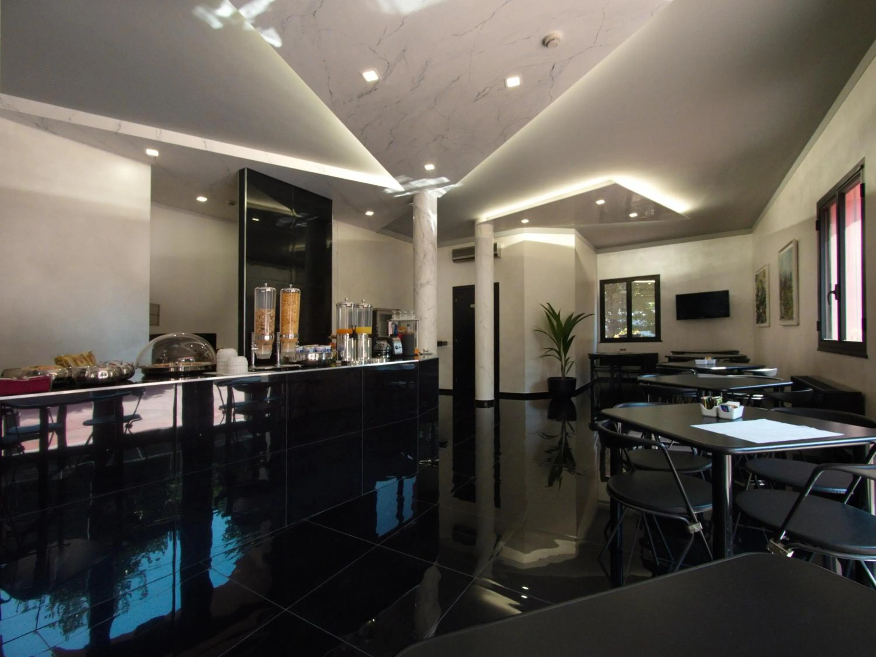 Lounge or bar in Hotel Versailles