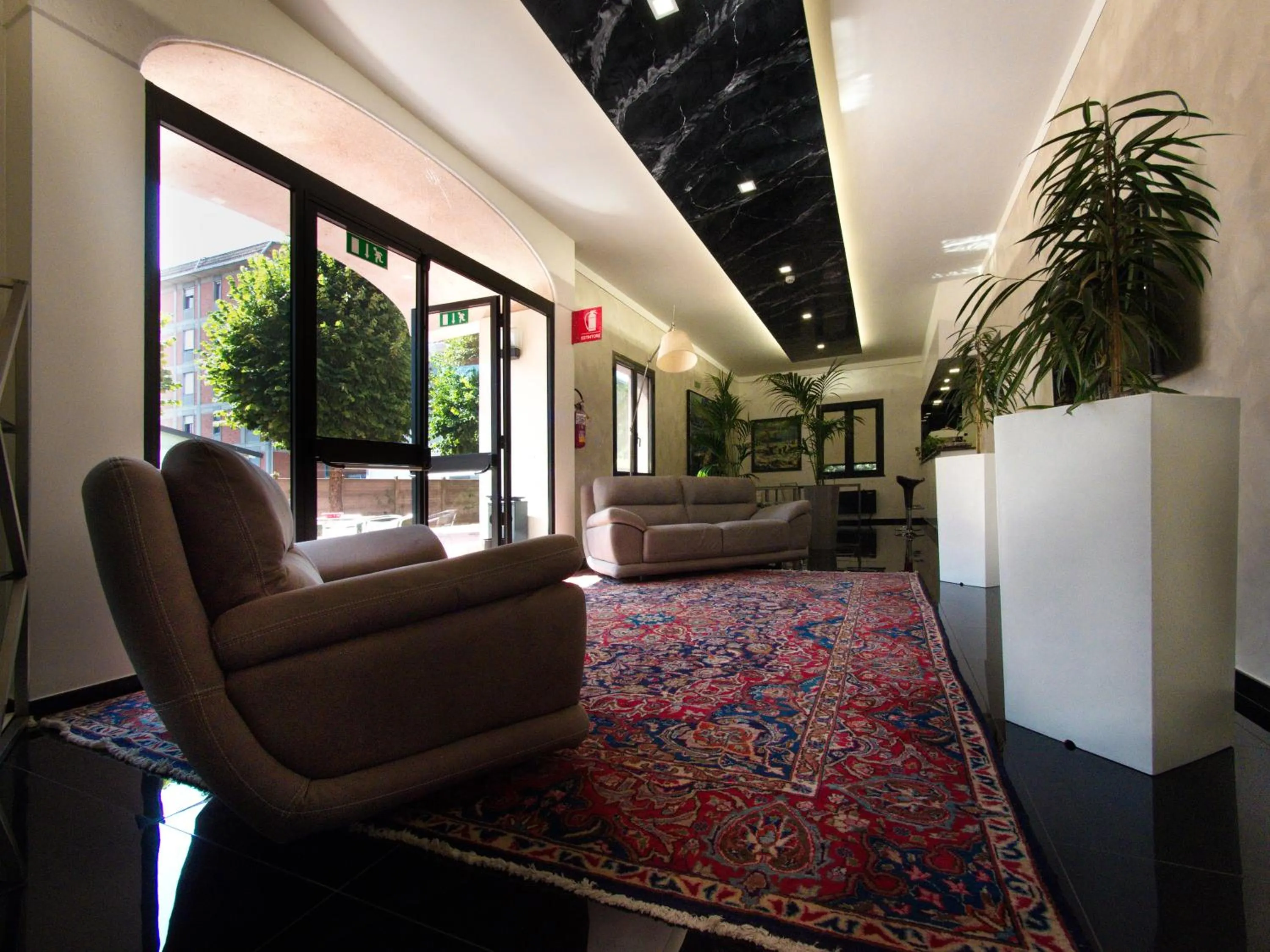 Lobby or reception in Hotel Versailles