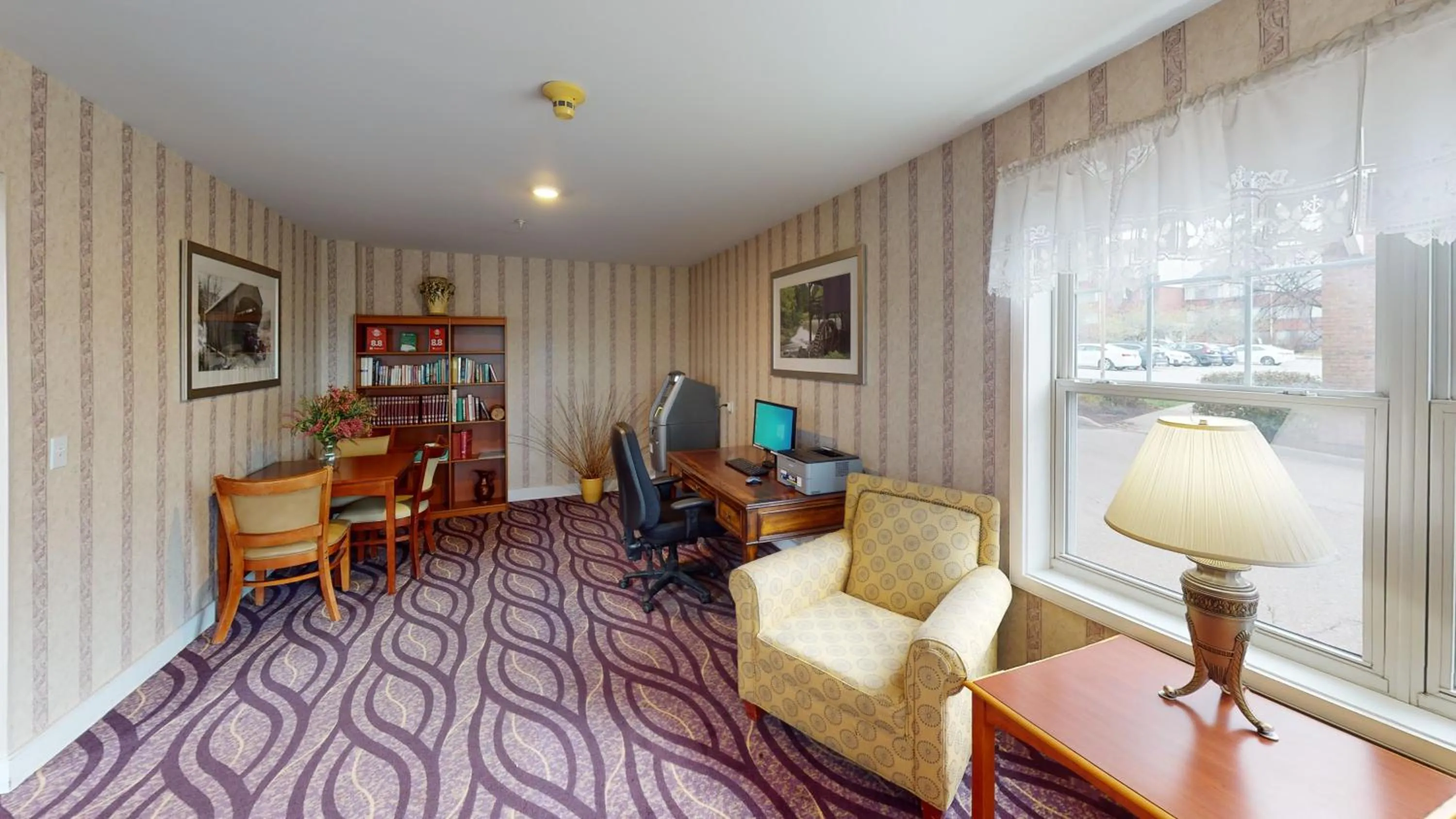 Library in Smart Suites, an Ascend Collection Hotel