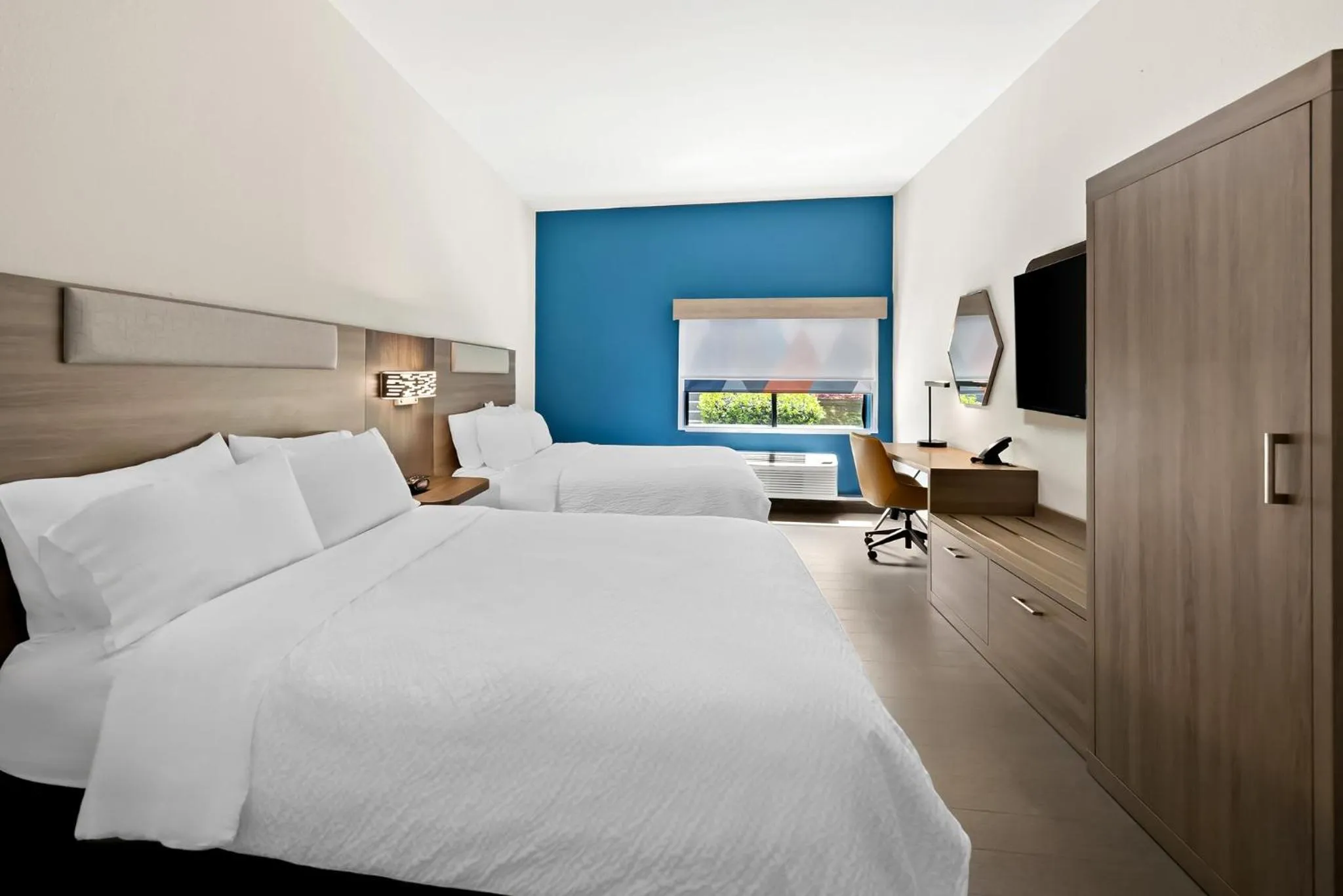 Photo of the whole room, Bed in Holiday Inn Express & Suites Raleigh NE - Medical Ctr Area by IHG