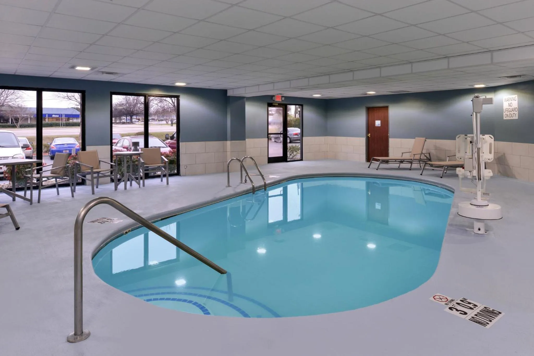 Swimming pool in Holiday Inn Express & Suites Raleigh NE - Medical Ctr Area by IHG