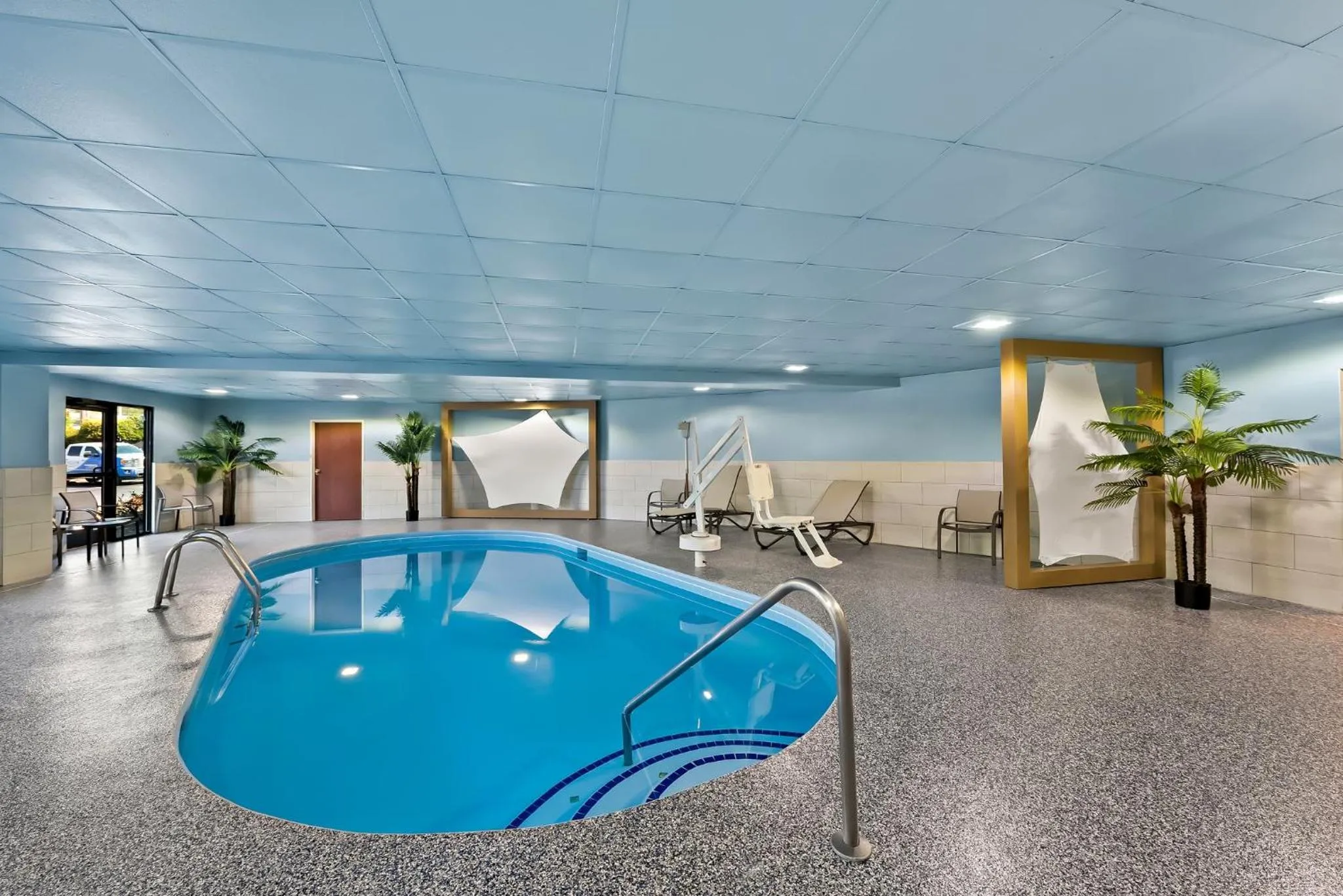 Swimming pool in Holiday Inn Express & Suites Raleigh NE - Medical Ctr Area by IHG