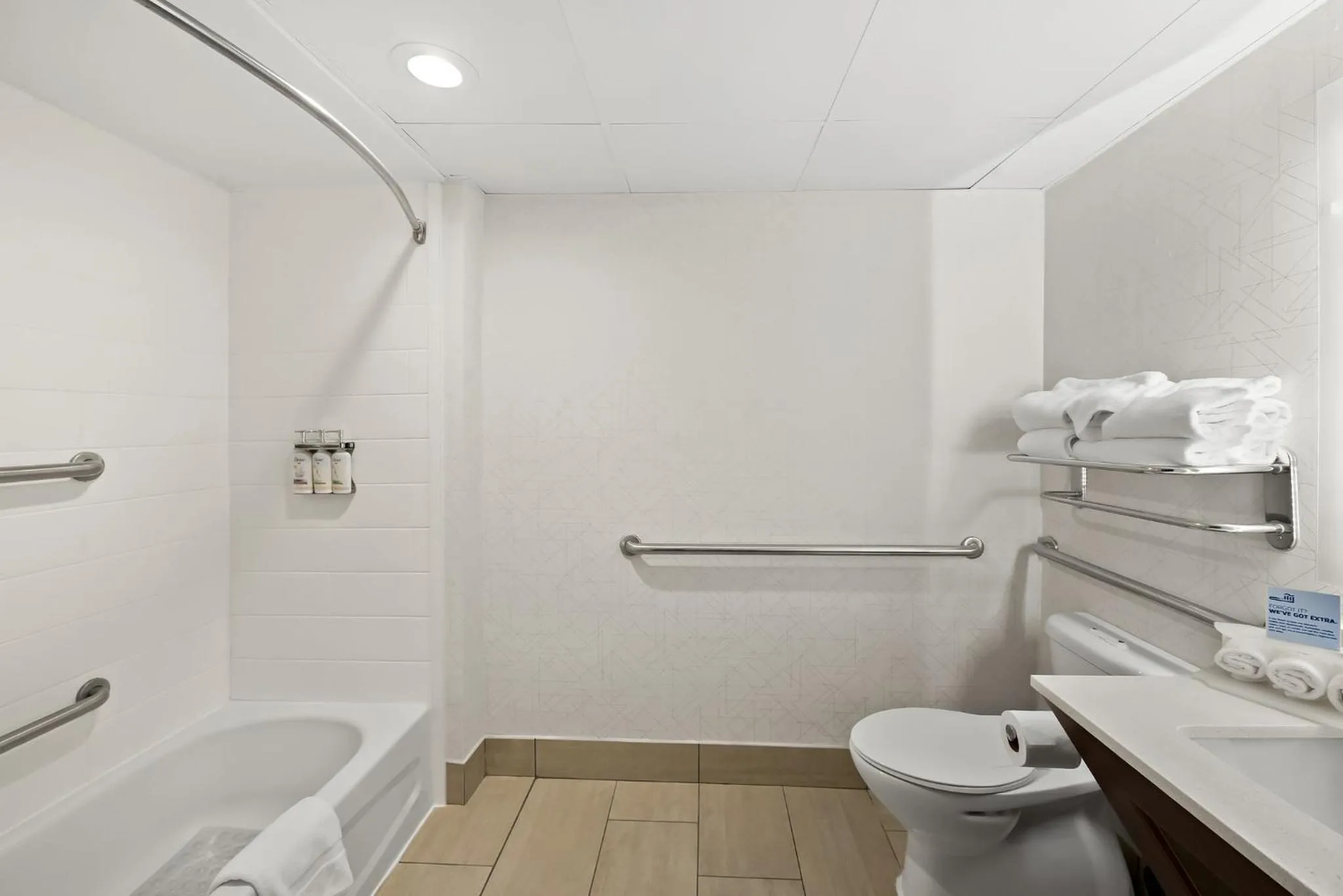 Bathroom in Holiday Inn Express & Suites Raleigh NE - Medical Ctr Area by IHG