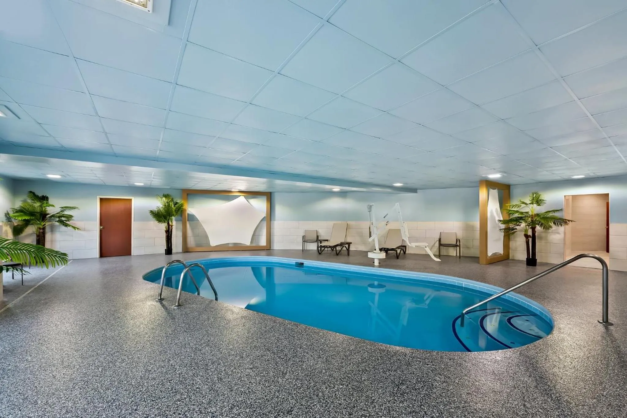 Swimming pool in Holiday Inn Express & Suites Raleigh NE - Medical Ctr Area by IHG