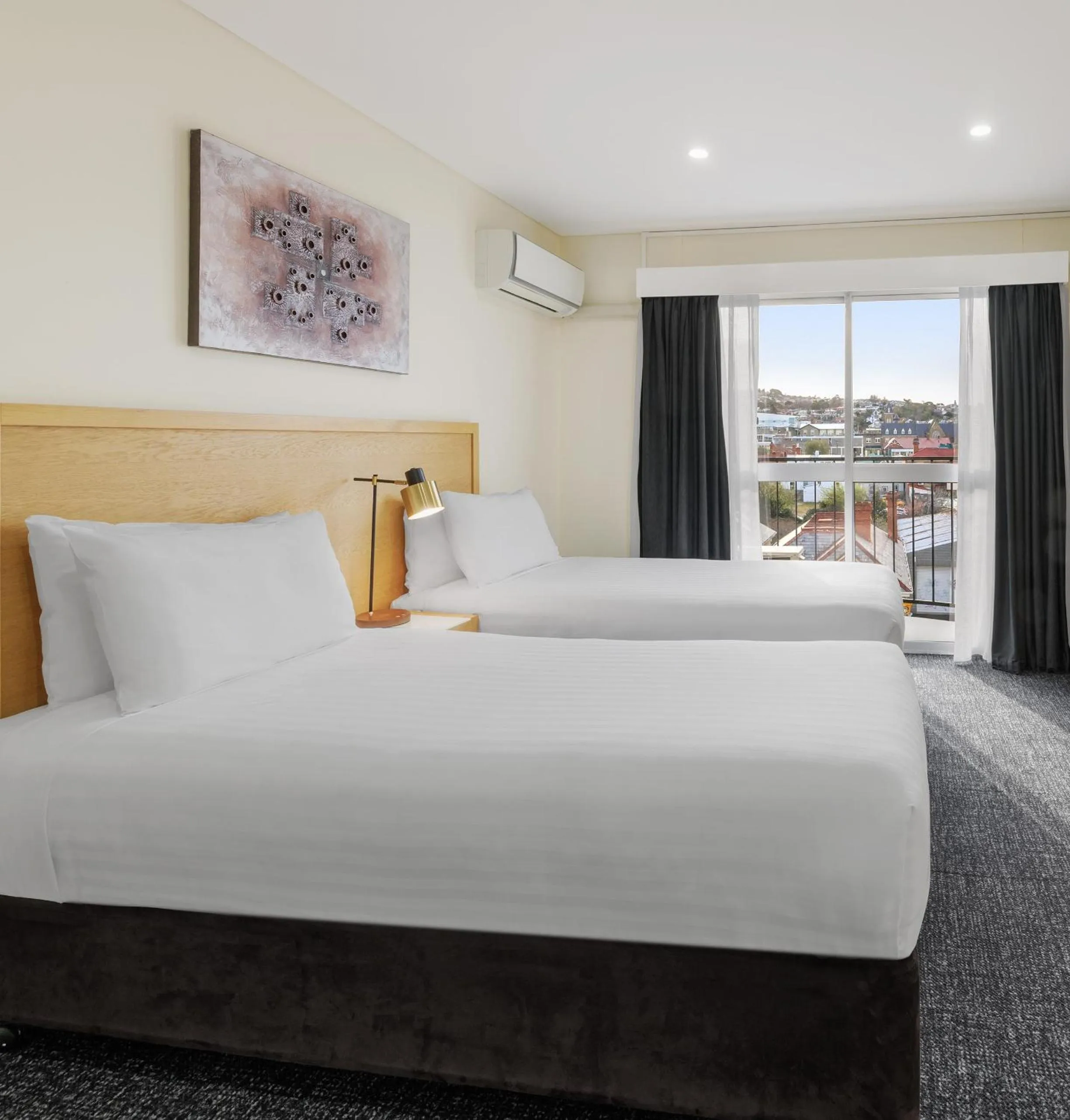 Bed in Best Western Hobart