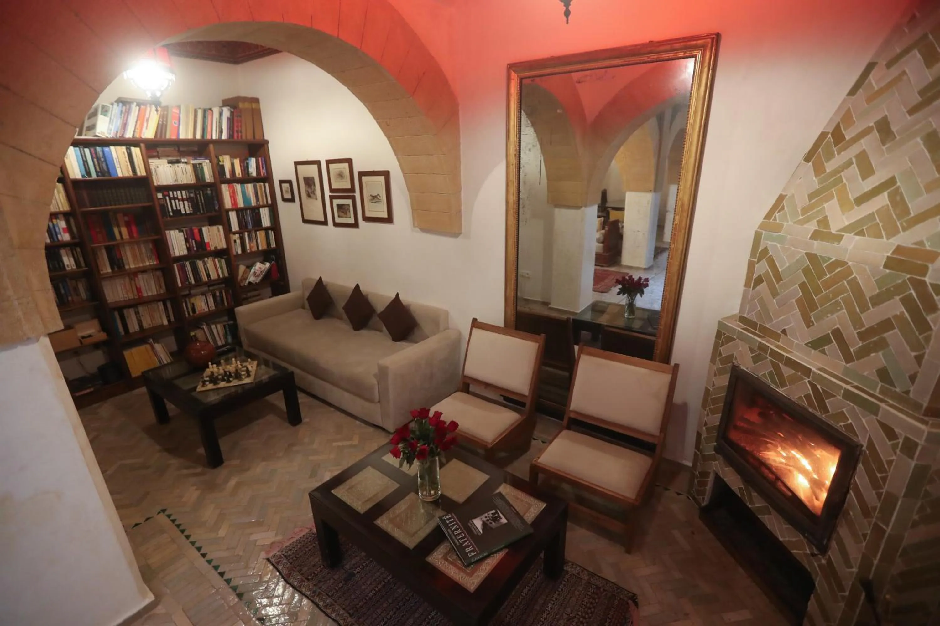 Communal lounge/ TV room in Riad Perle D'Eau