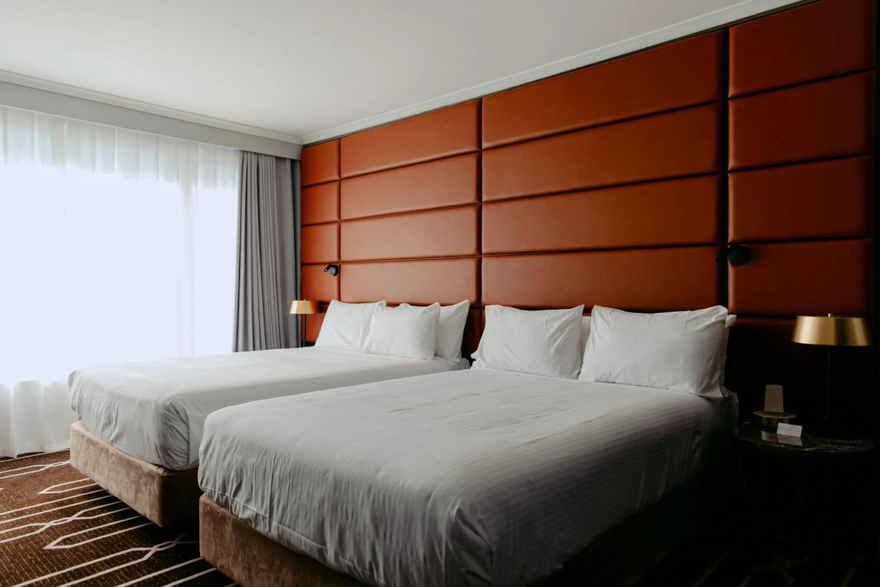 Bed in Mercure Sydney Parramatta