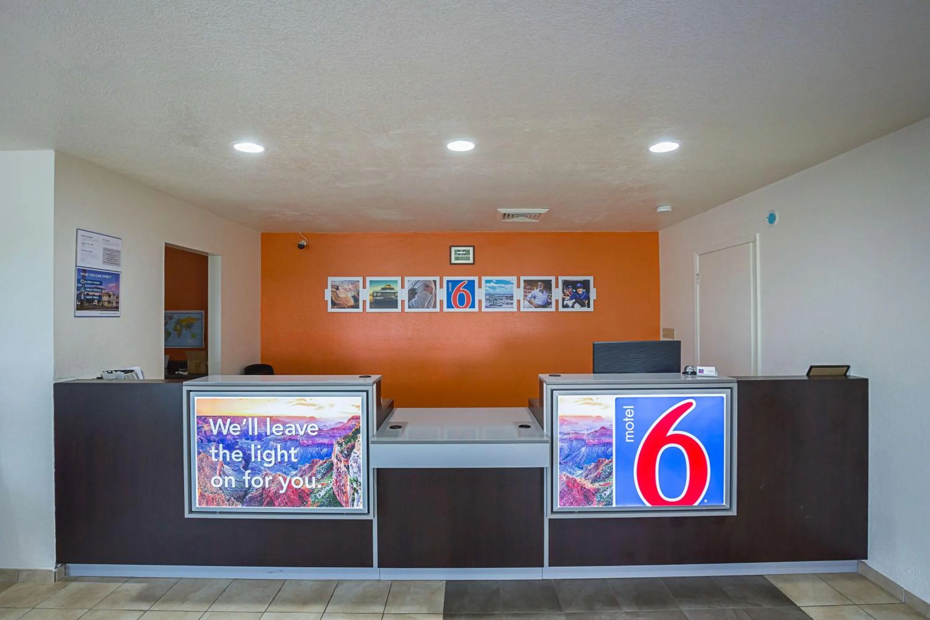Property logo or sign in Motel 6-Madisonville, TX