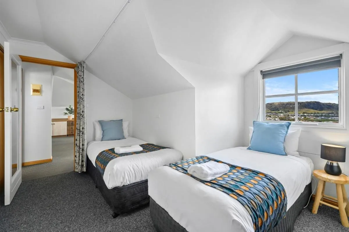 Bed in Stanley Seaview Inn