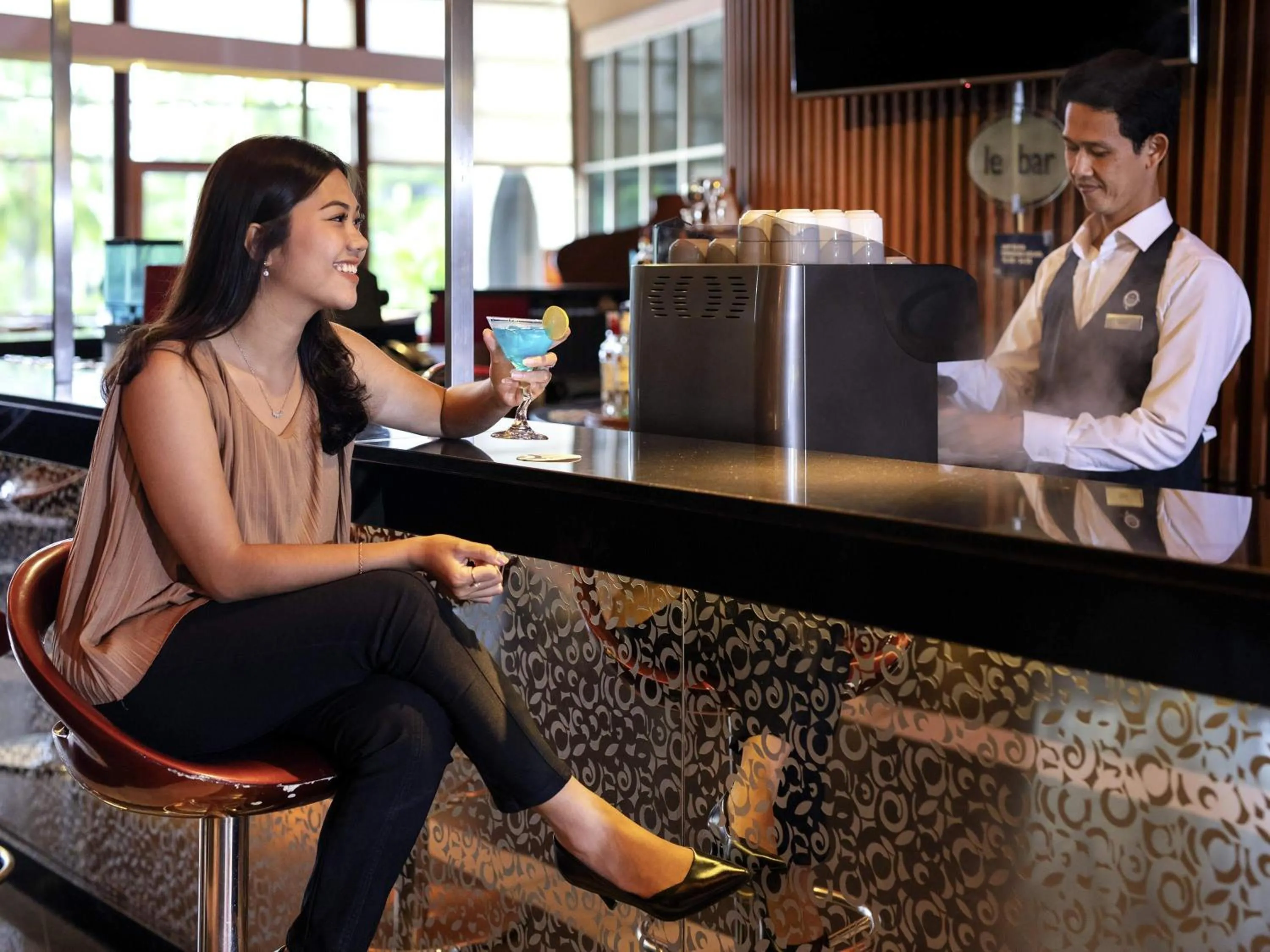 Lounge or bar in Novotel Palembang