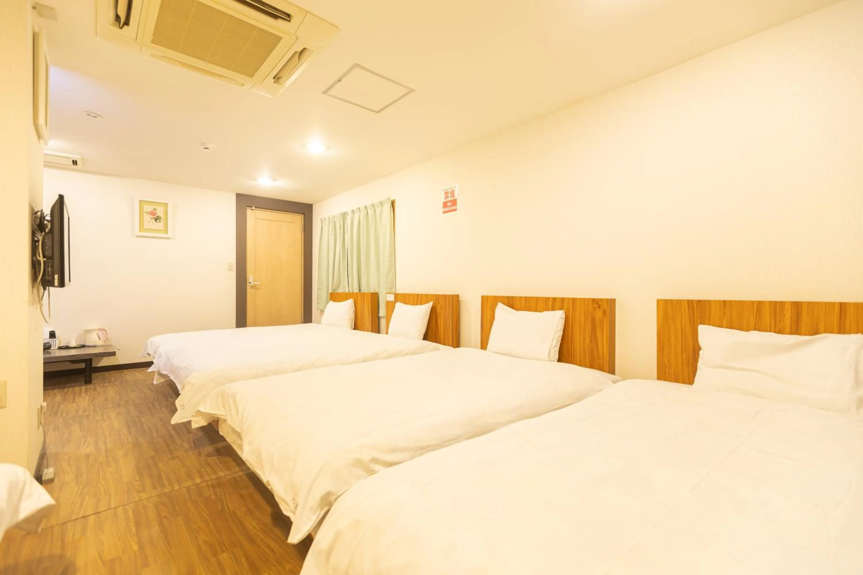 Bed in Hotel Naniwa