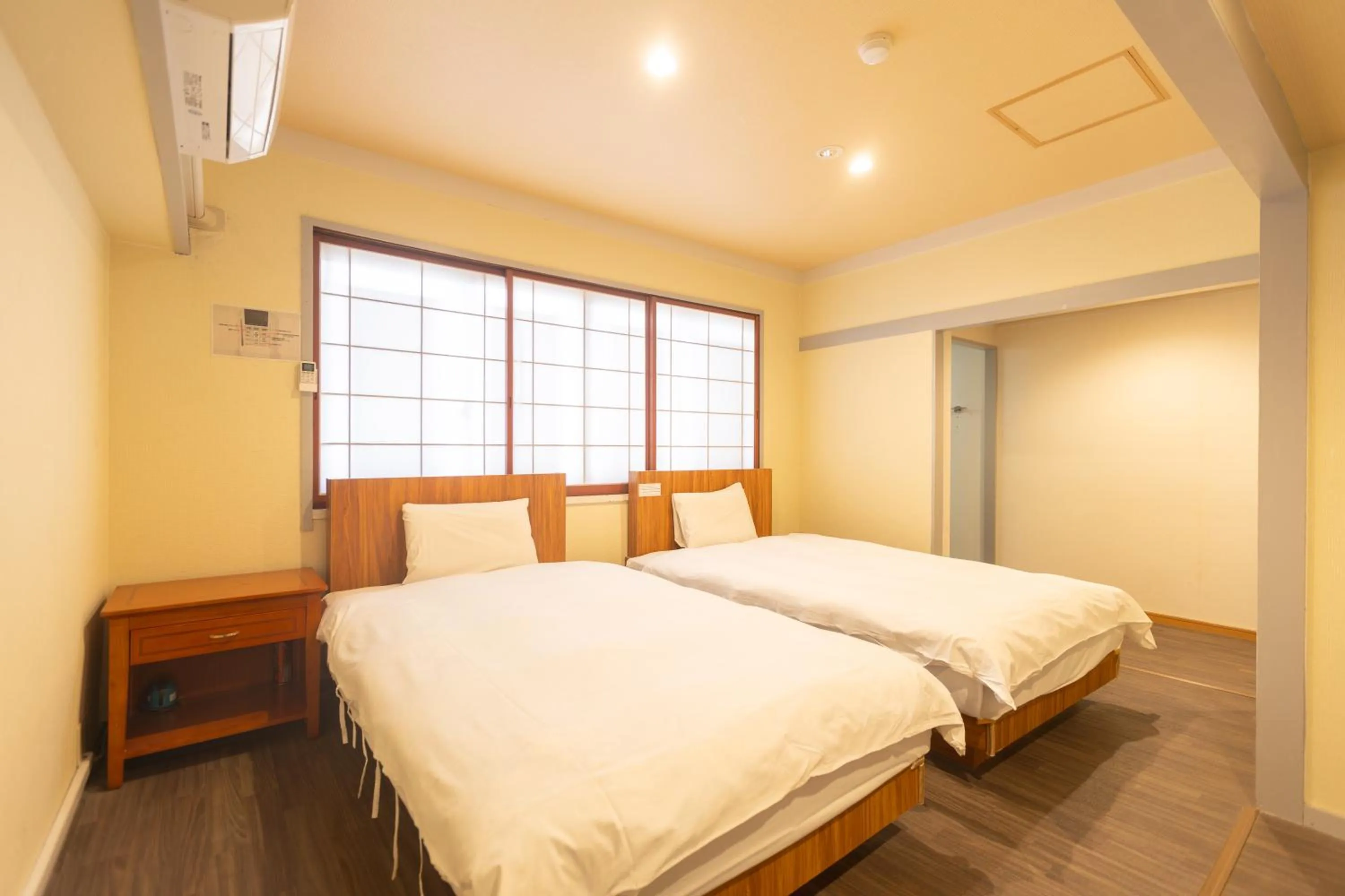 Bed in Hotel Naniwa
