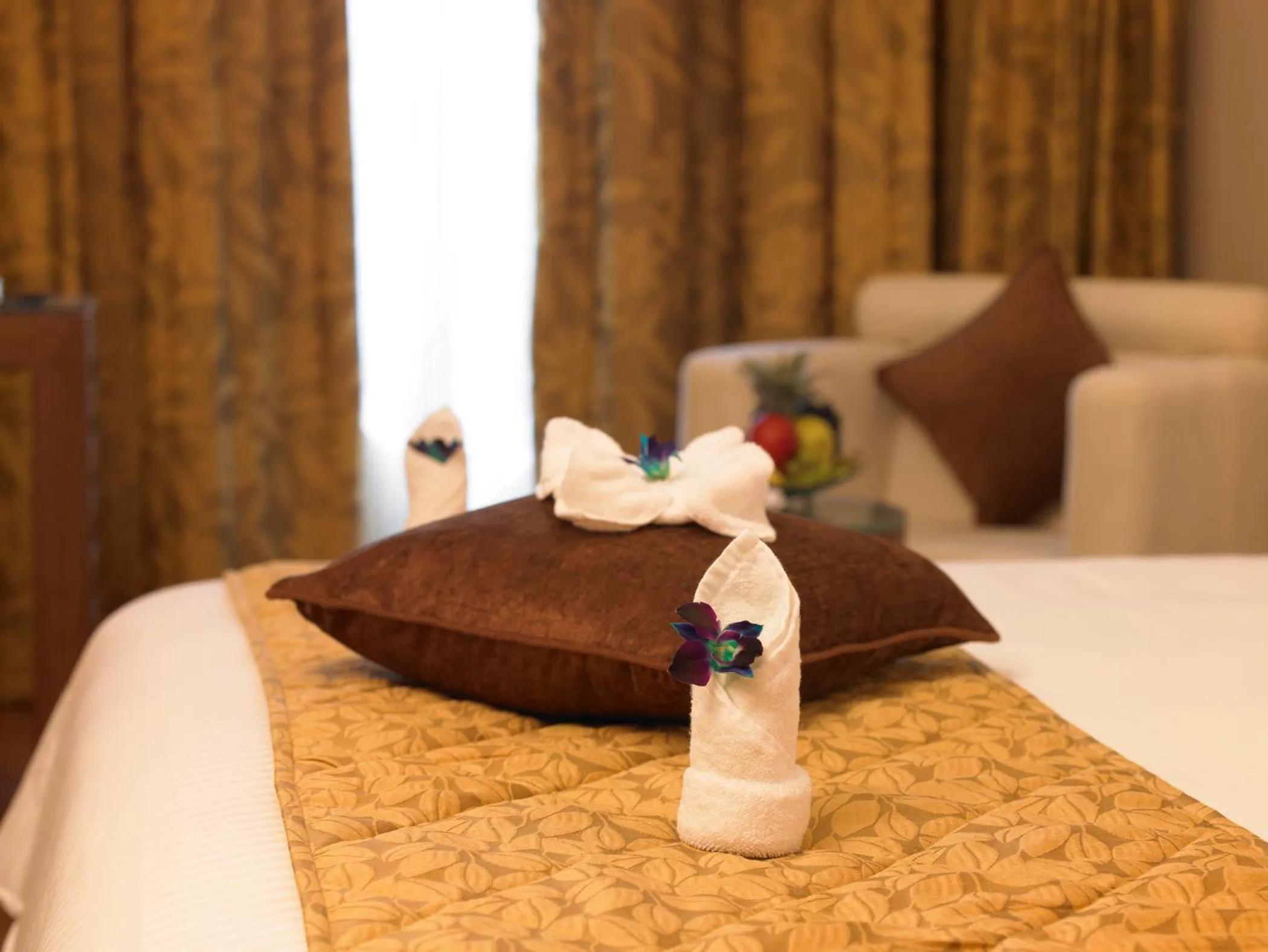 Decorative detail, Bed in Blu Petal - A Business Hotel