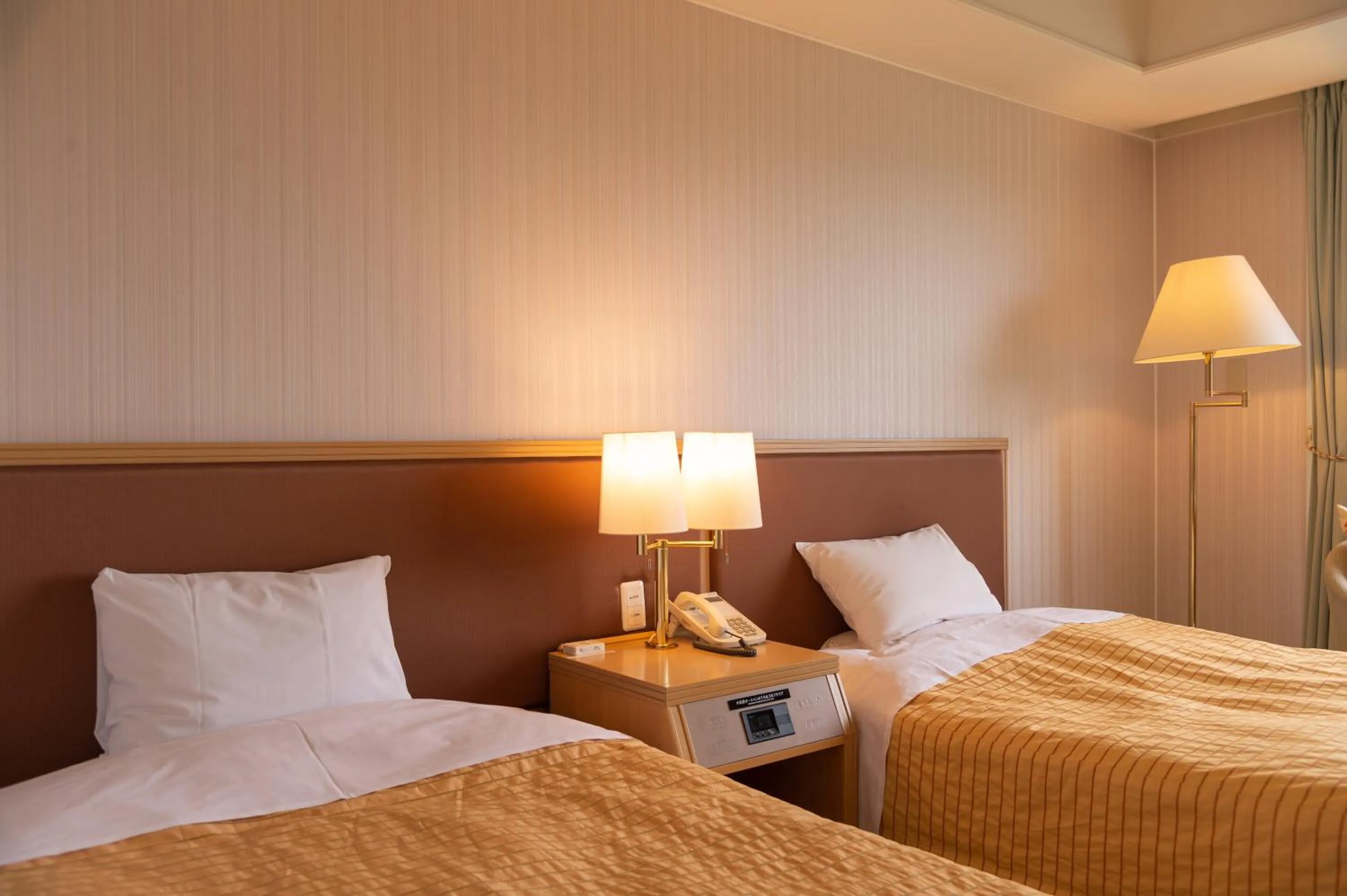 Bed in Onahama Ocean Hotel & Golf Club